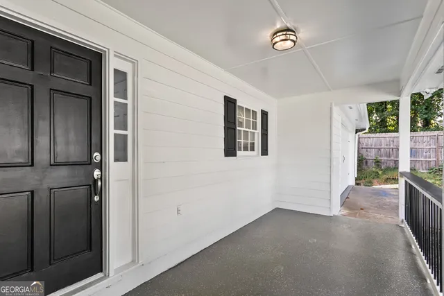 a view of livingroom with furniture and window