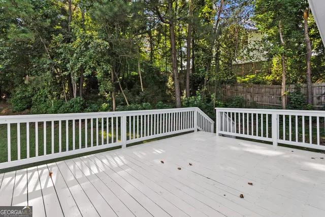 a view of deck with a garden