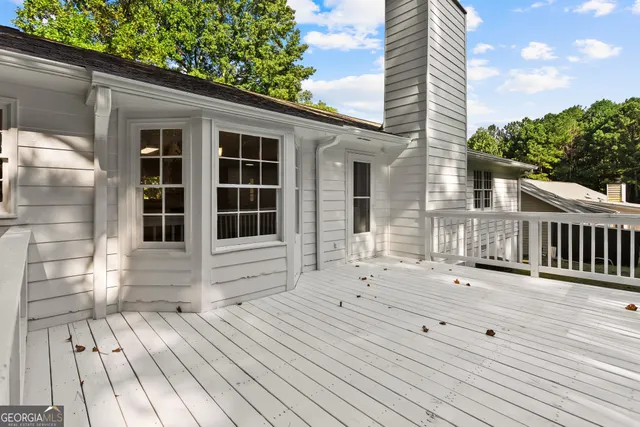 a view of a house with a roof deck