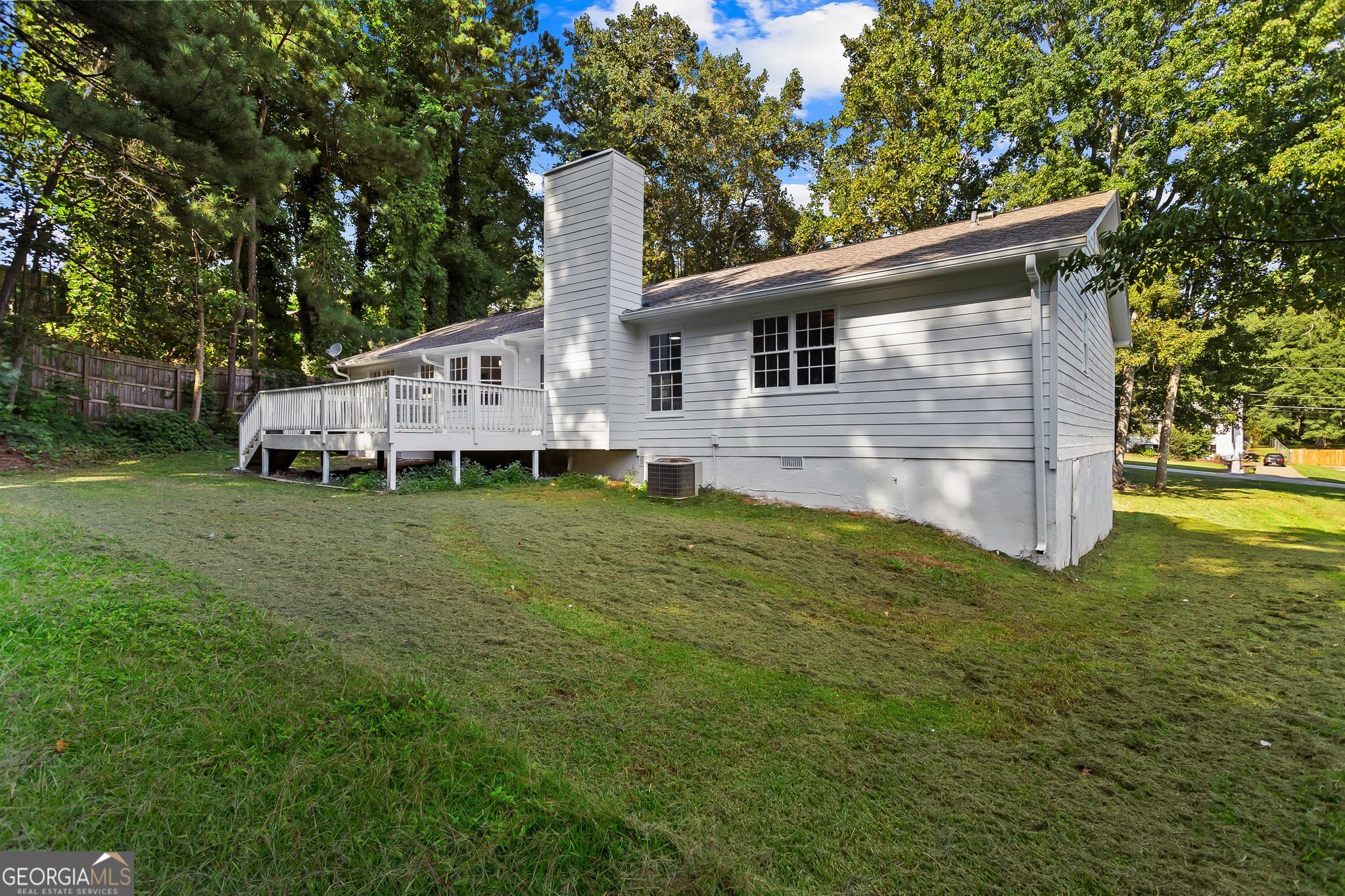 3620 Knoll Crest Trail Buford, GA 30519 - Photo 42 of 47 a front view of house with a garden