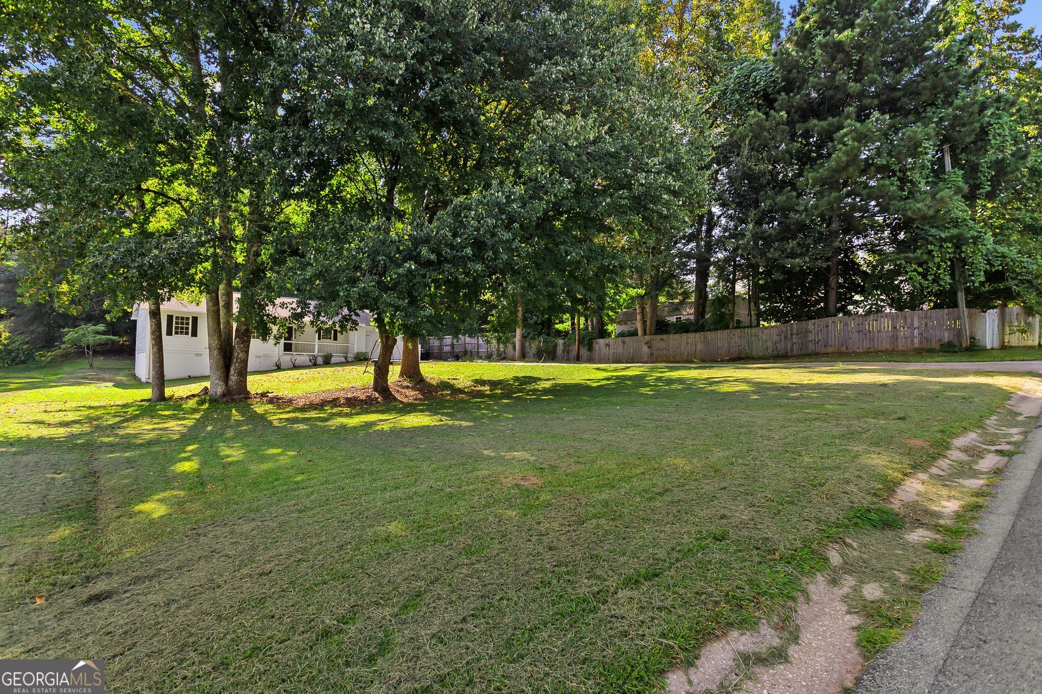 3620 Knoll Crest Trail Buford, GA 30519 - Photo 46 of 47 a swimming pool with outdoor seating and yard