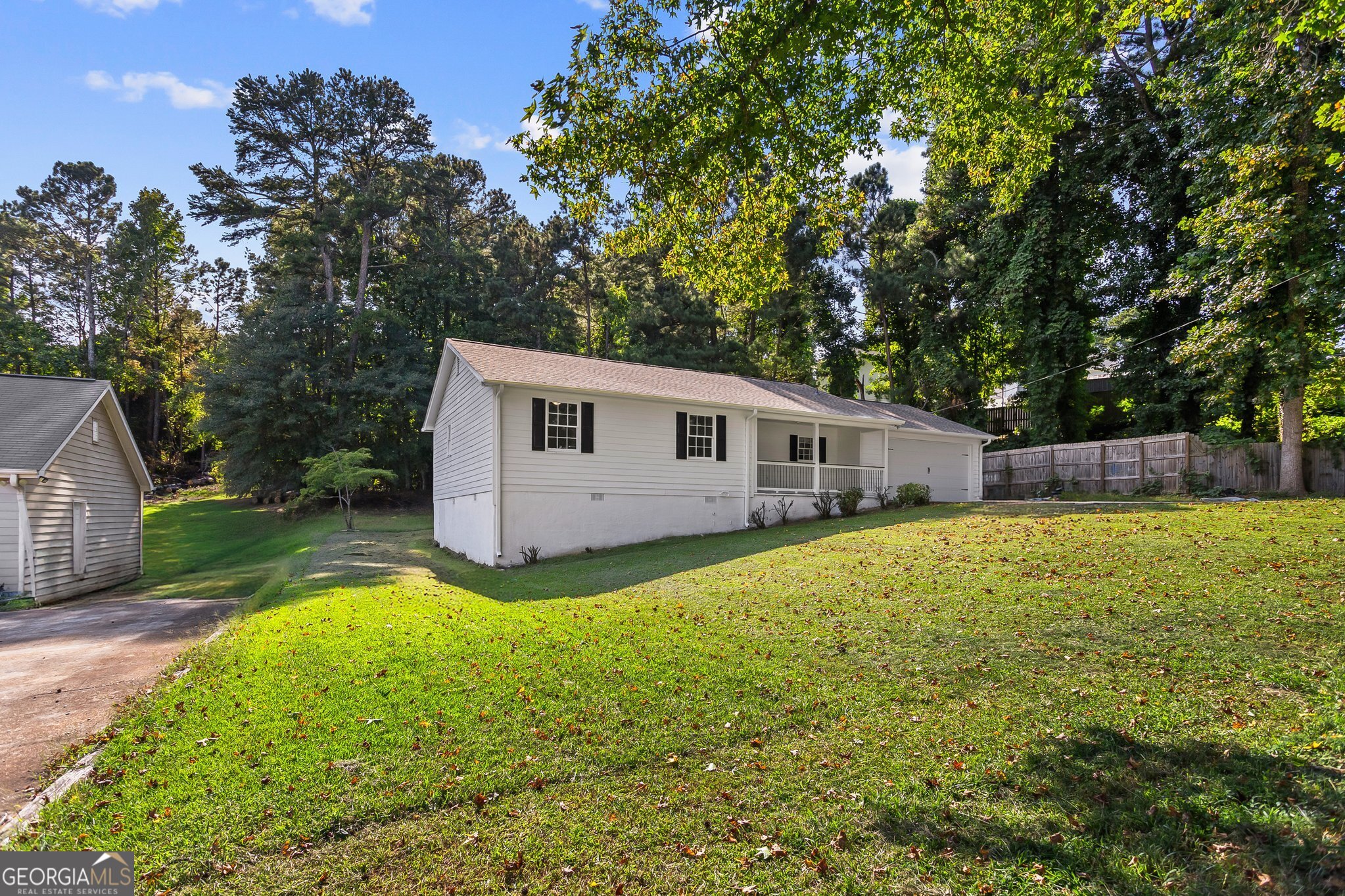 3620 Knoll Crest Trail Buford, GA 30519 - Photo 47 of 47 a view of a house with a backyard