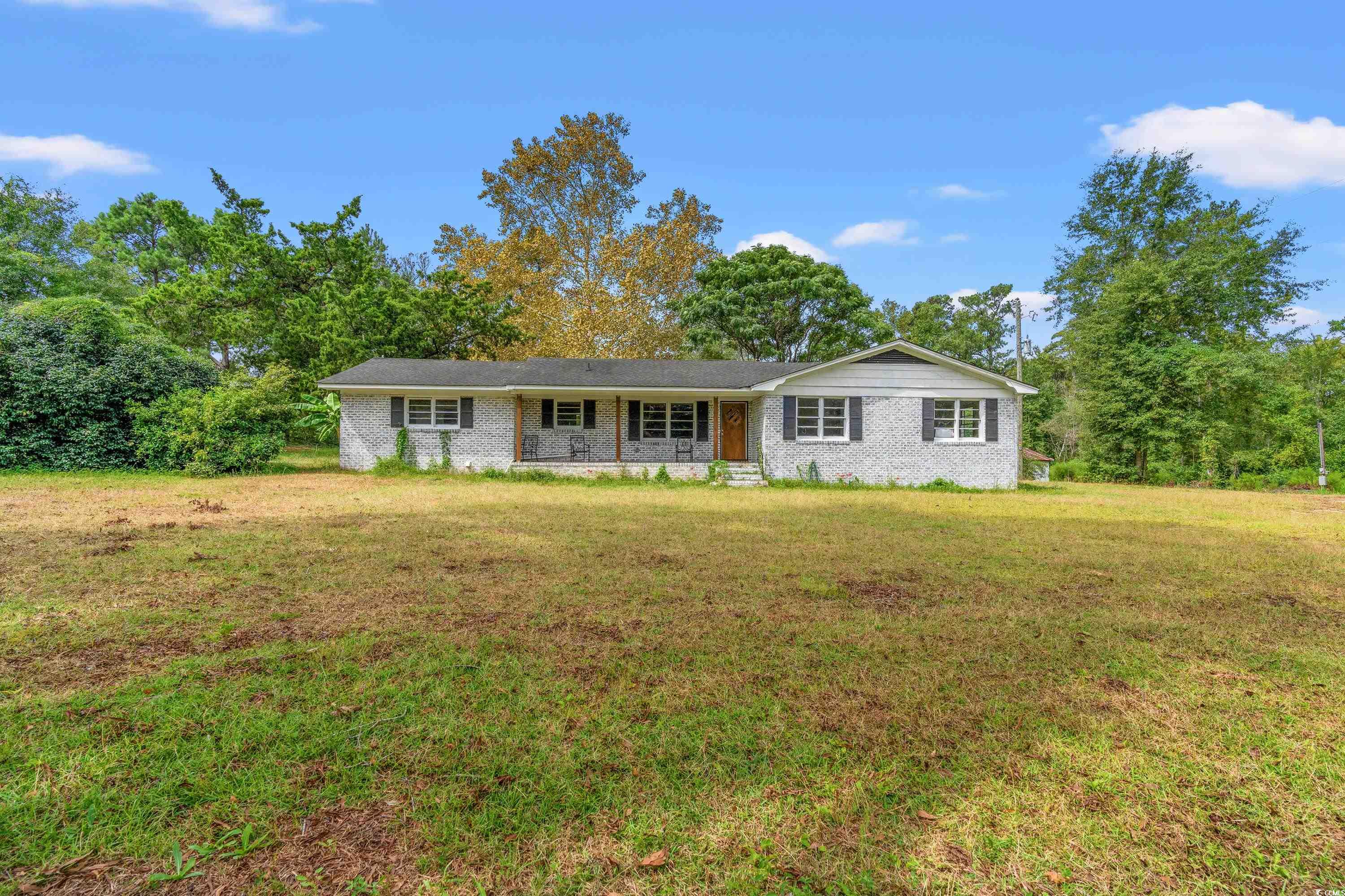 476 Live Oak Church Road Loris, SC 29569 - Photo 1 of 39 Ranch-style house with a front lawn