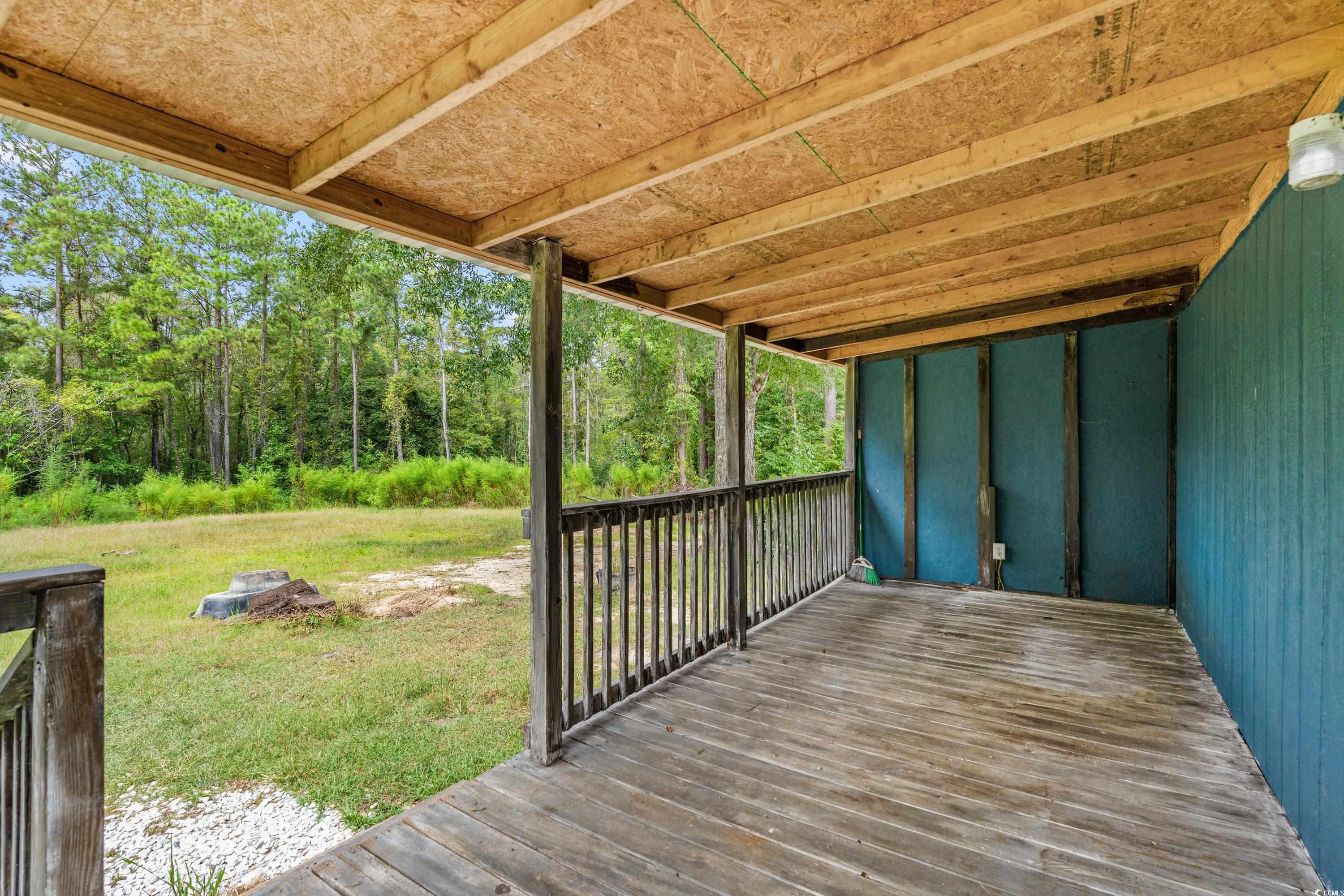 476 Live Oak Church Road Loris, SC 29569 - Photo 24 of 39 Deck with a yard