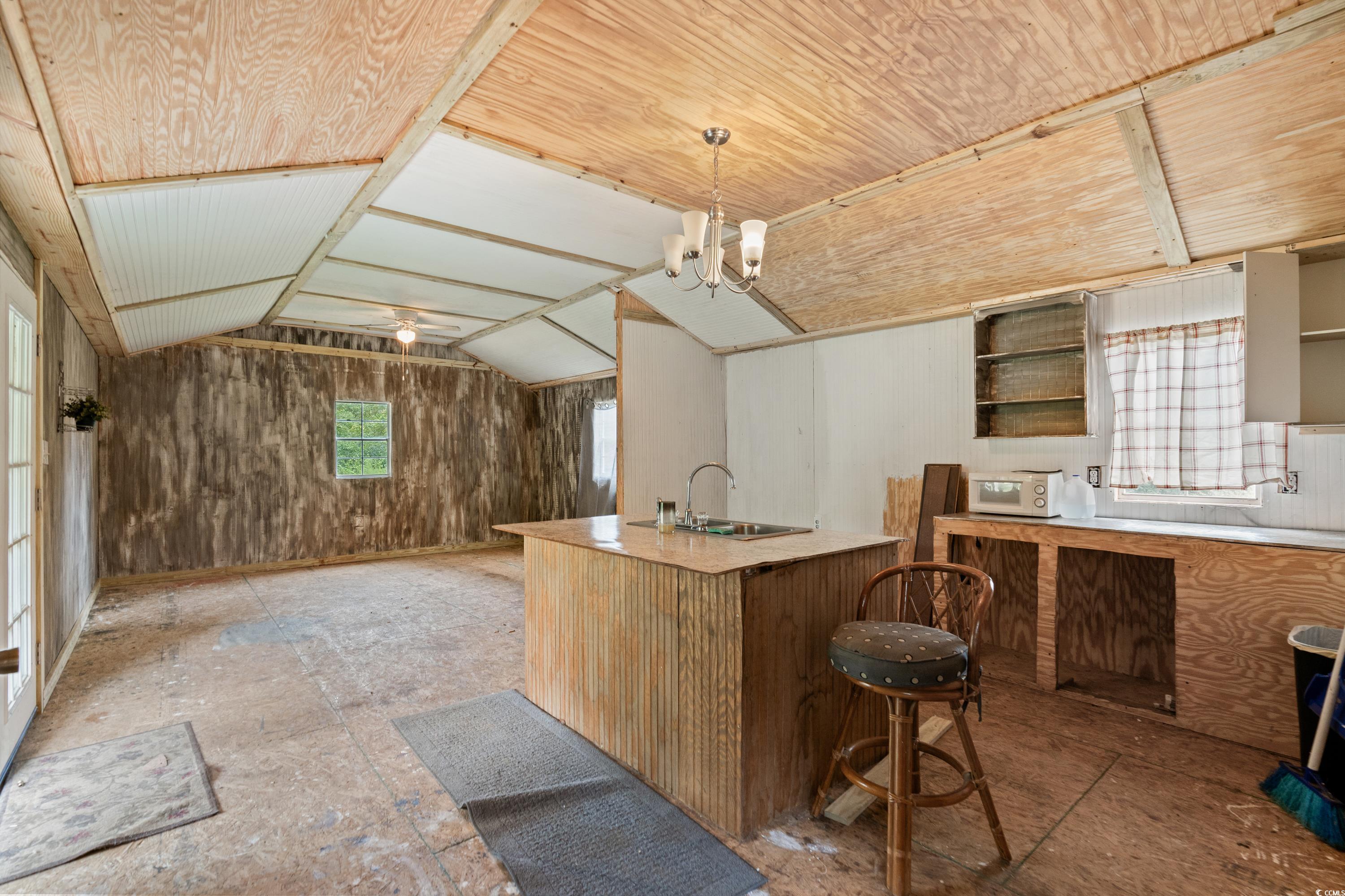 476 Live Oak Church Road Loris, SC 29569 - Photo 28 of 39 Kitchen featuring lofted ceiling, pendant lighting
