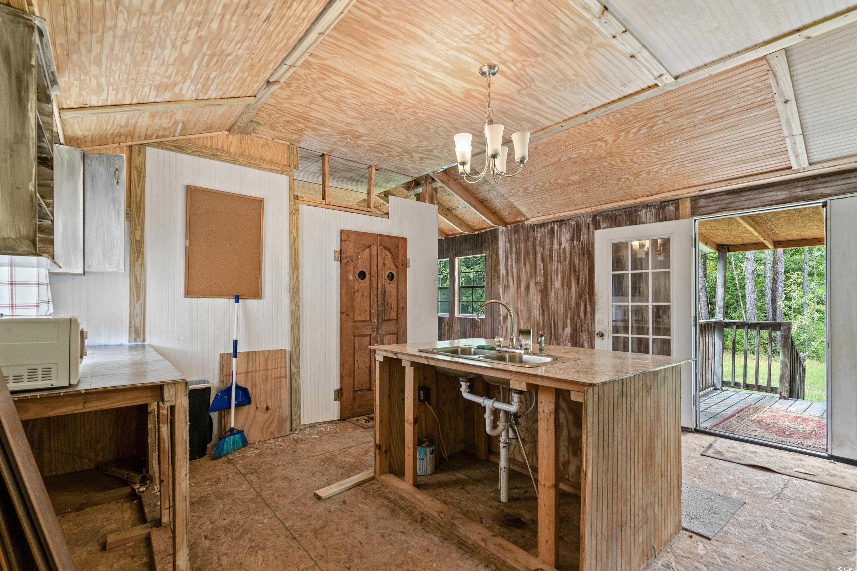 476 Live Oak Church Road Loris, SC 29569 - Photo 29 of 39 Kitchen featuring lofted ceiling, sink, a notable