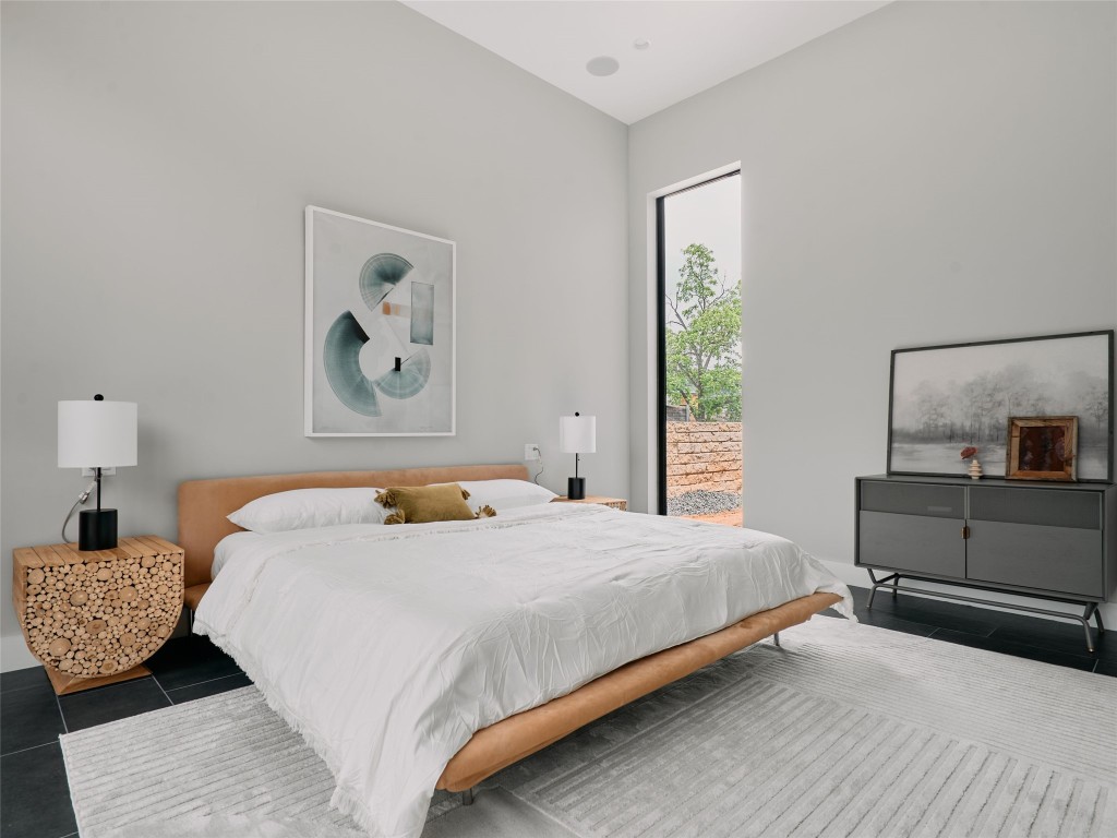 412 Kemp Street Austin, TX 78741 - Photo 19 of 37 Bedroom featuring tile patterned flooring