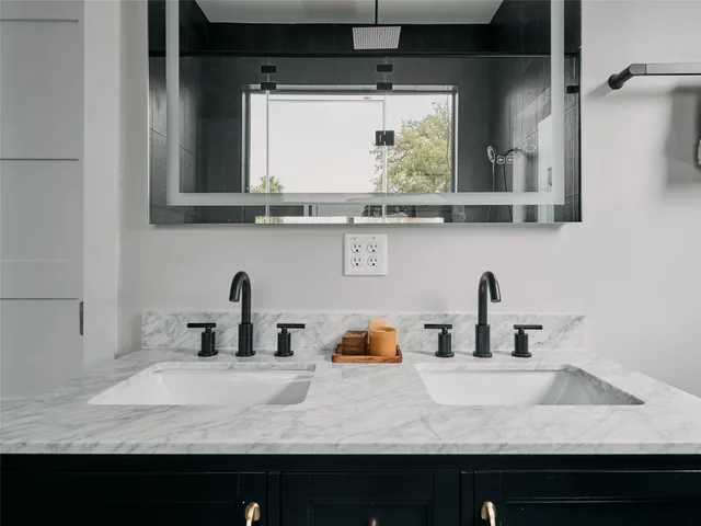 a bathroom with a bathtub and window