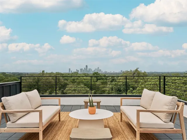 a view of a living room with furniture