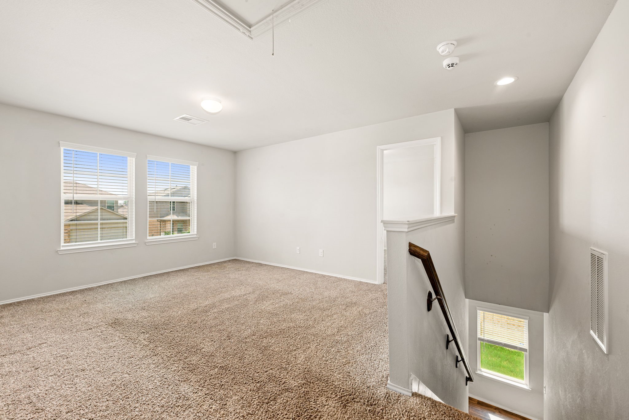 23119 Rivercane Shadow Trail Spring, TX 77373 - Photo 13 of 29 a view of an empty room with a window