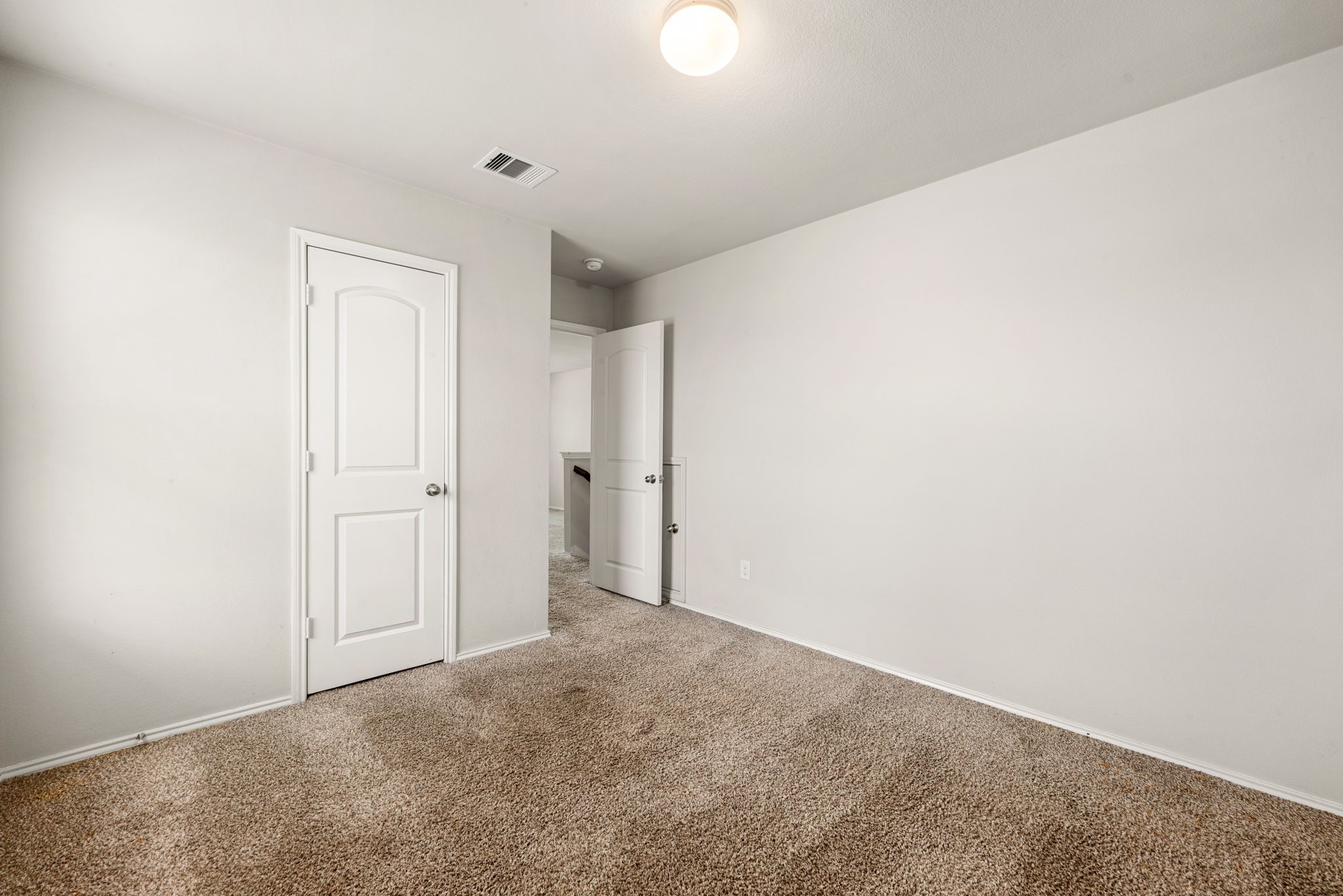 23119 Rivercane Shadow Trail Spring, TX 77373 - Photo 16 of 29 a view of an empty room