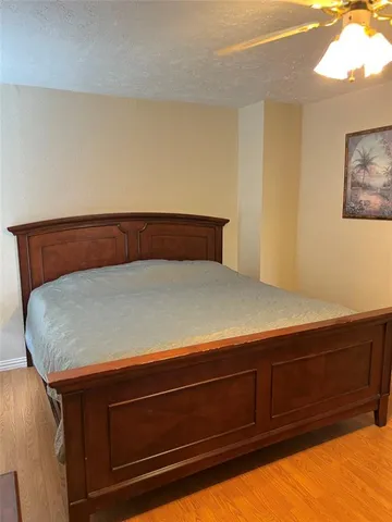 a bathroom with a toilet a sink and a mirror