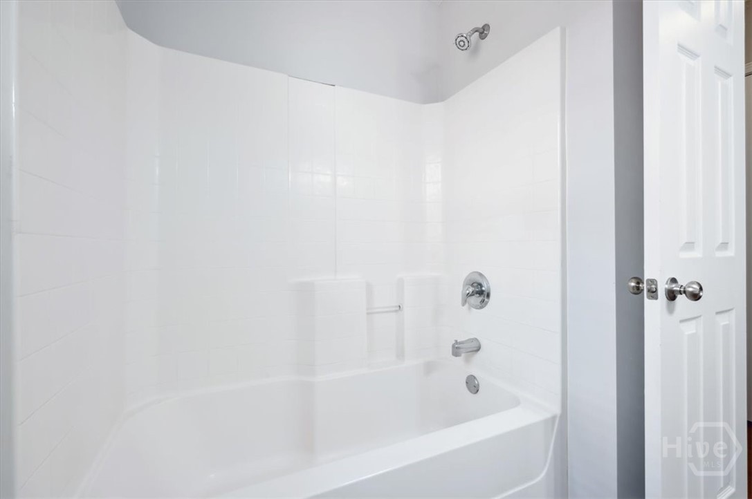 24 Stalwick Drive Pooler, GA 31322 - Photo 25 of 34 The second full bath features a shower over tub.