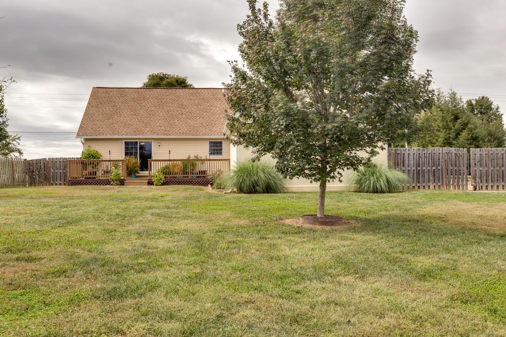 3636 Mahlon Moore Road Spring Hill, TN 37174 - Photo 4 of 22 a front view of a house with a yard