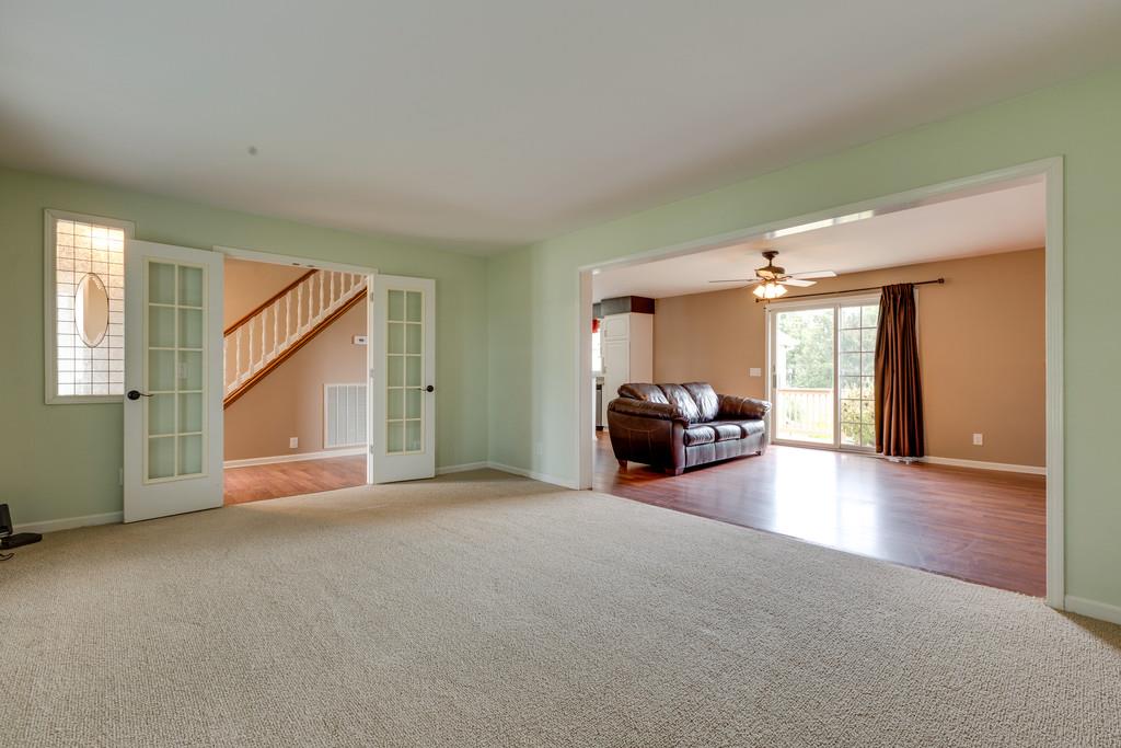 3636 Mahlon Moore Road Spring Hill, TN 37174 - Photo 5 of 22 a view of a livingroom with furniture and an entryway