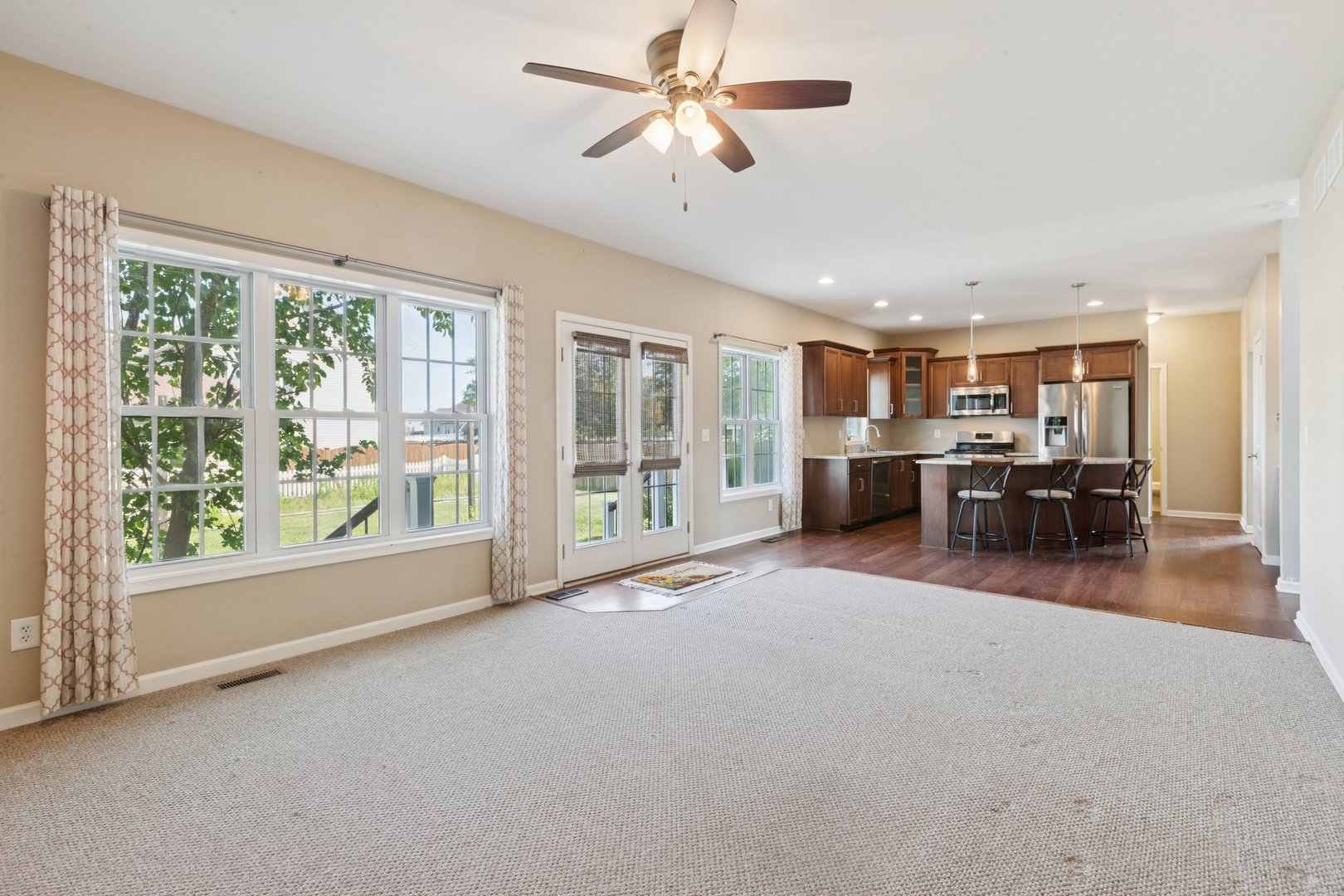345 South Calkey Street Diamond, IL 60416 - Photo 18 of 50 a living room with furniture and a large window
