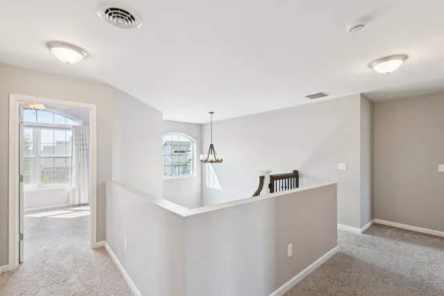 a view of a kitchen with a sink and dishwasher