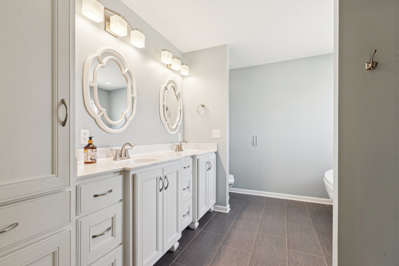 345 South Calkey Street Diamond, IL 60416 - Photo 24 of 50 a spacious bathroom with a double vanity sink and a mirror
