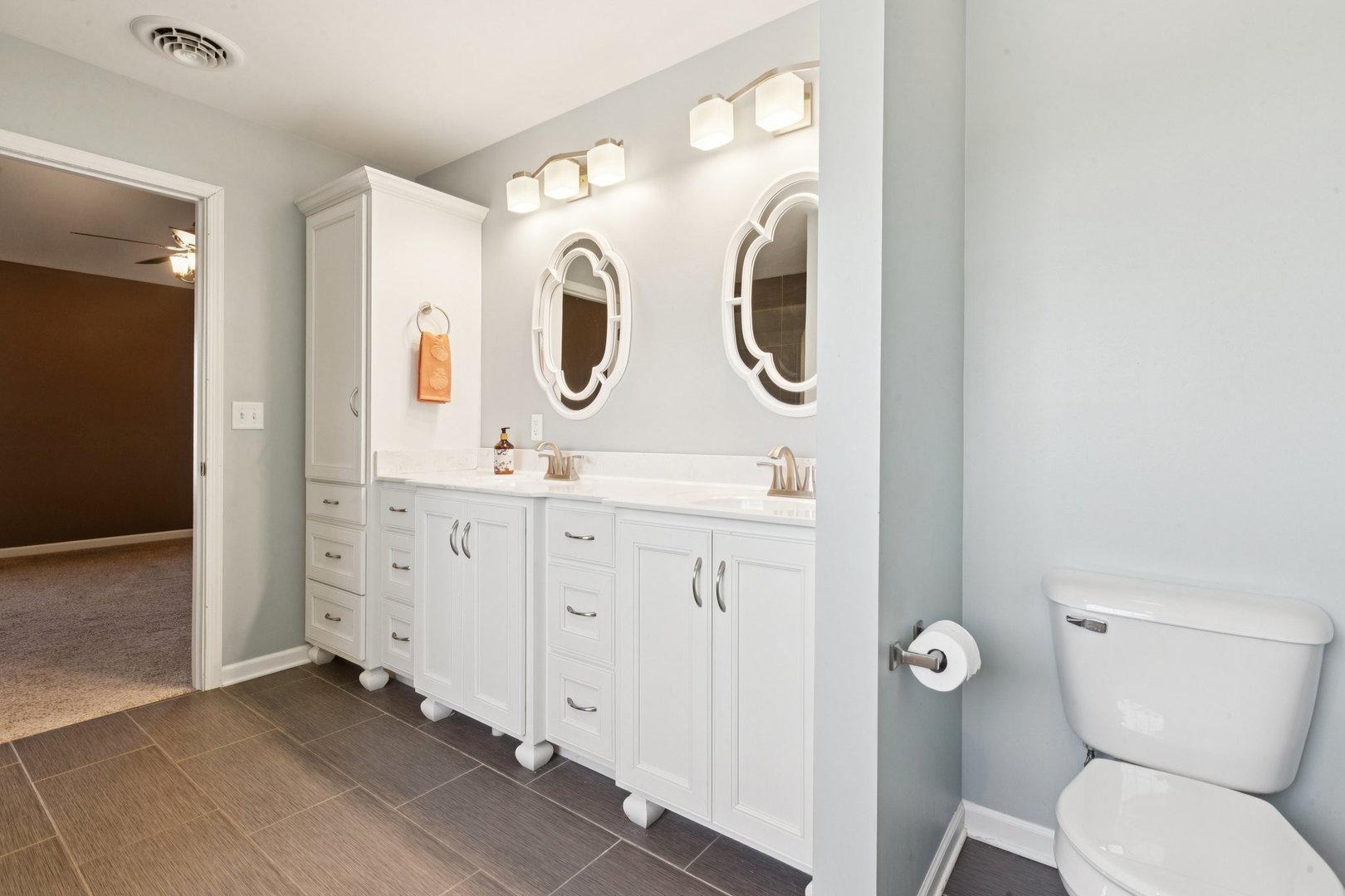 345 South Calkey Street Diamond, IL 60416 - Photo 25 of 50 a bathroom with a toilet sink and mirror