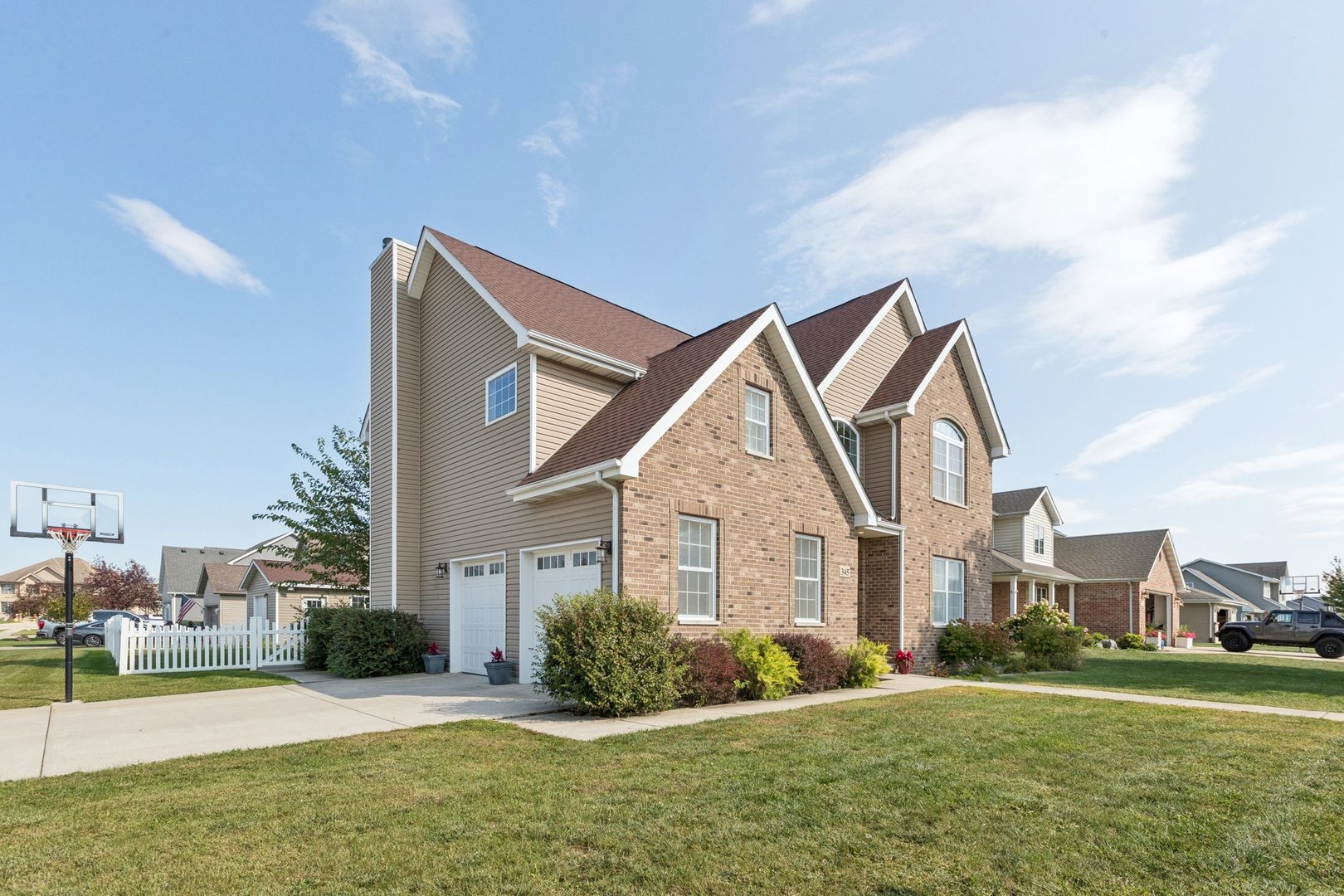 345 South Calkey Street Diamond, IL 60416 - Photo 3 of 50 a front view of a house with a yard