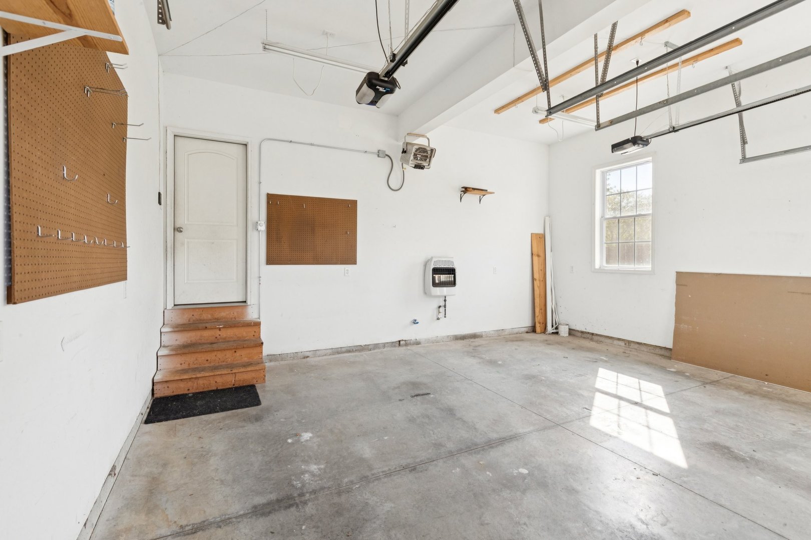 345 South Calkey Street Diamond, IL 60416 - Photo 43 of 50 a view of room with stairs and wooden floor