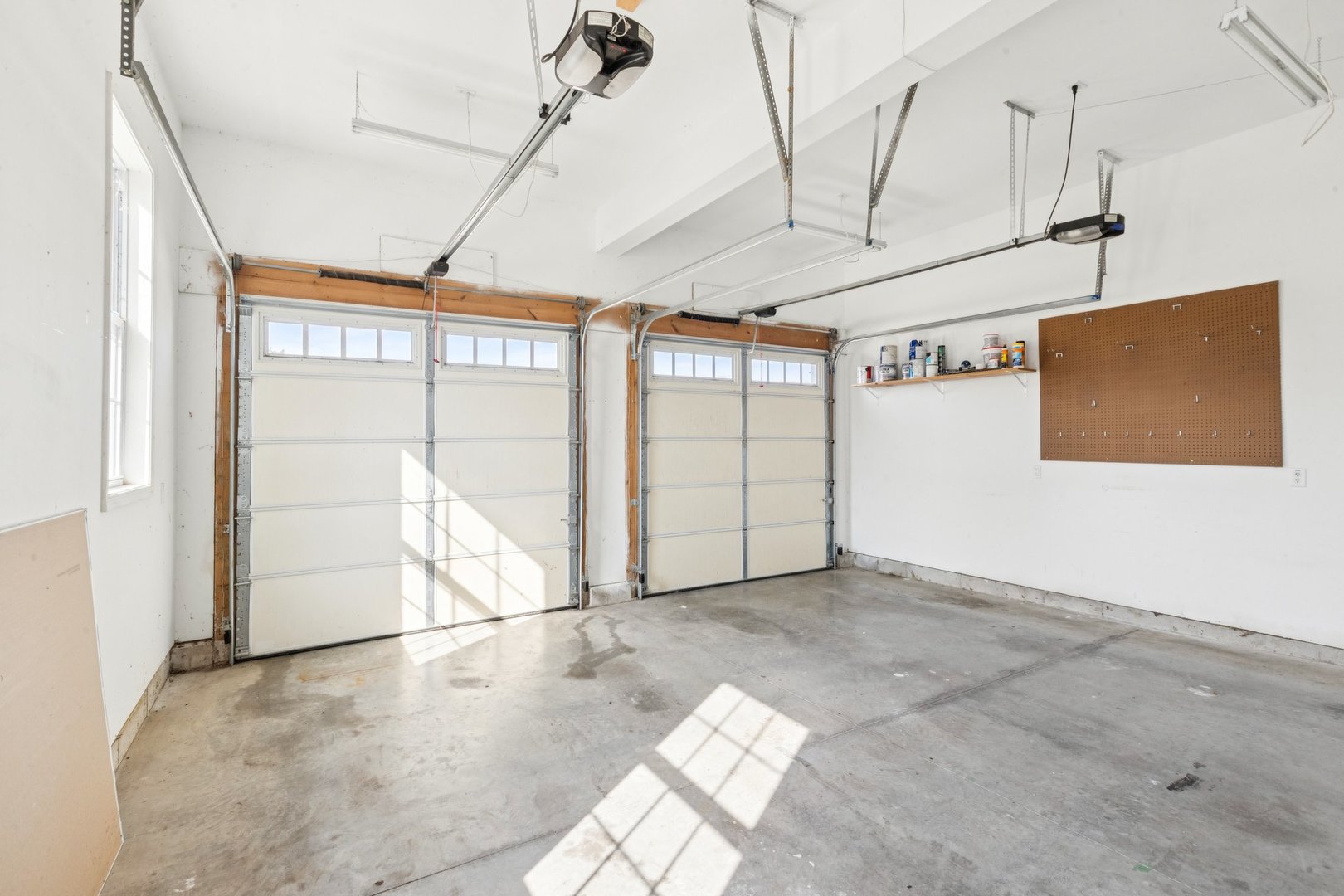 345 South Calkey Street Diamond, IL 60416 - Photo 44 of 50 a view of a livingroom with a ceiling fan and window