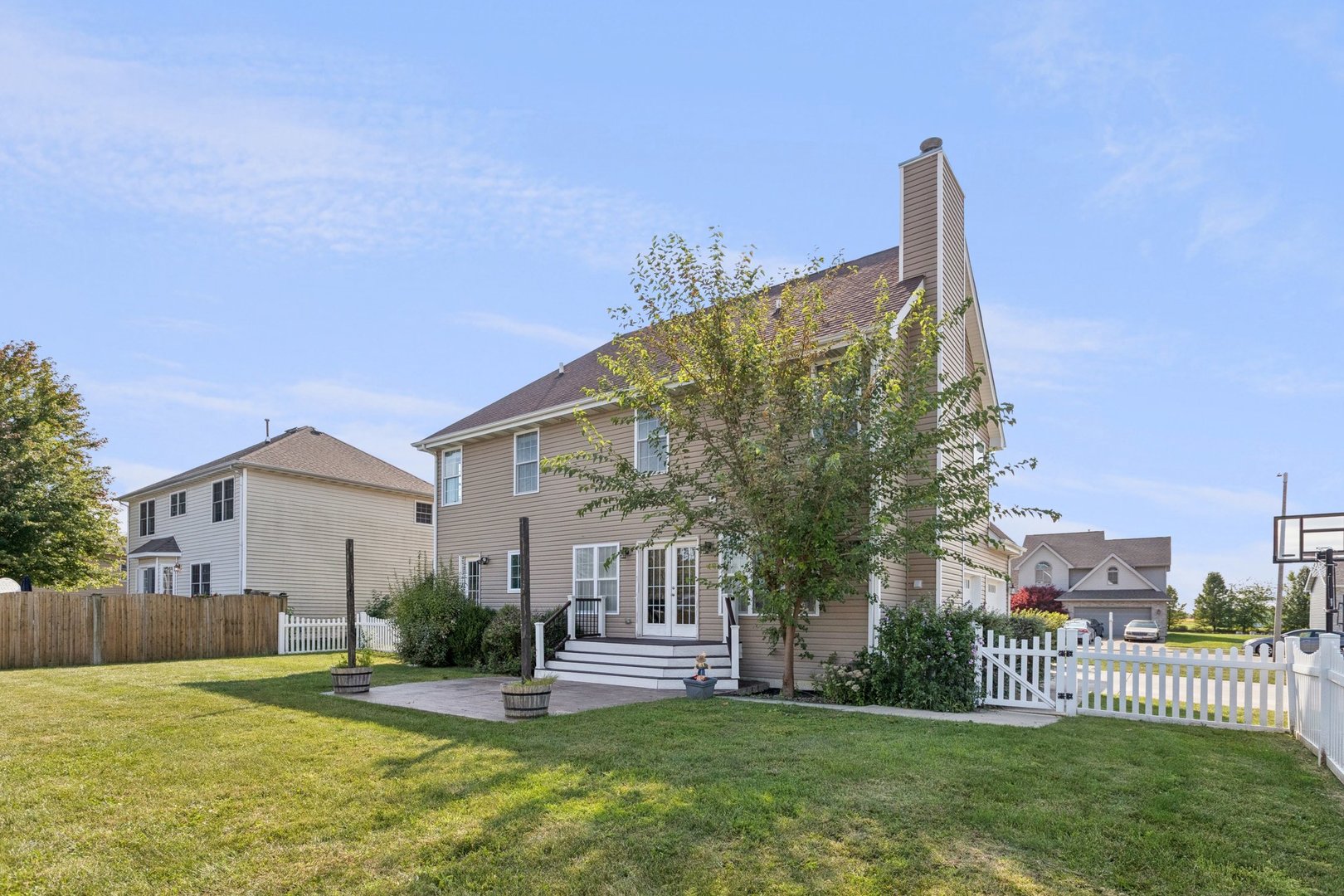 345 South Calkey Street Diamond, IL 60416 - Photo 46 of 50 a view of a house with a yard and table and chairs