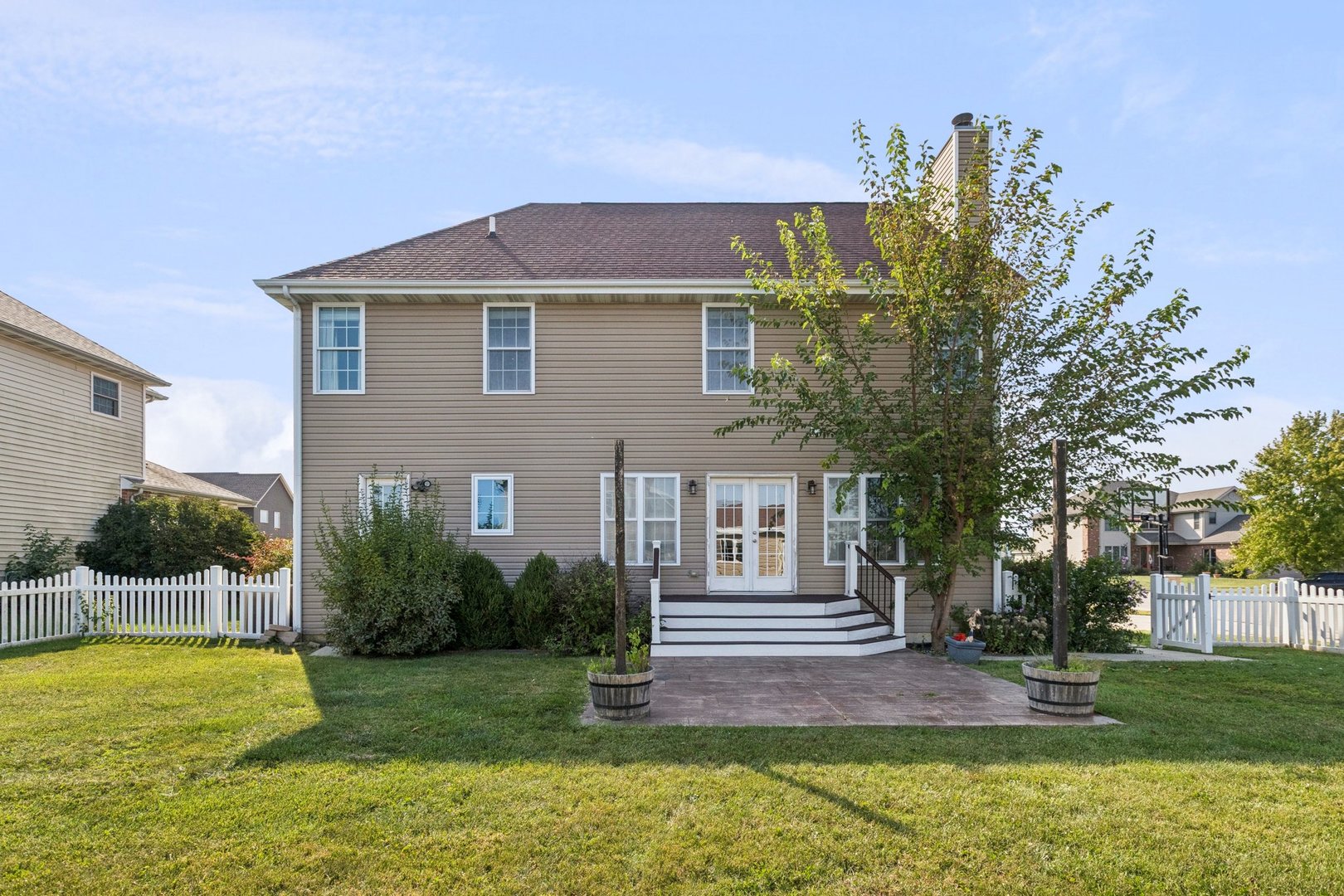 345 South Calkey Street Diamond, IL 60416 - Photo 47 of 50 a view of a house with a yard and plants