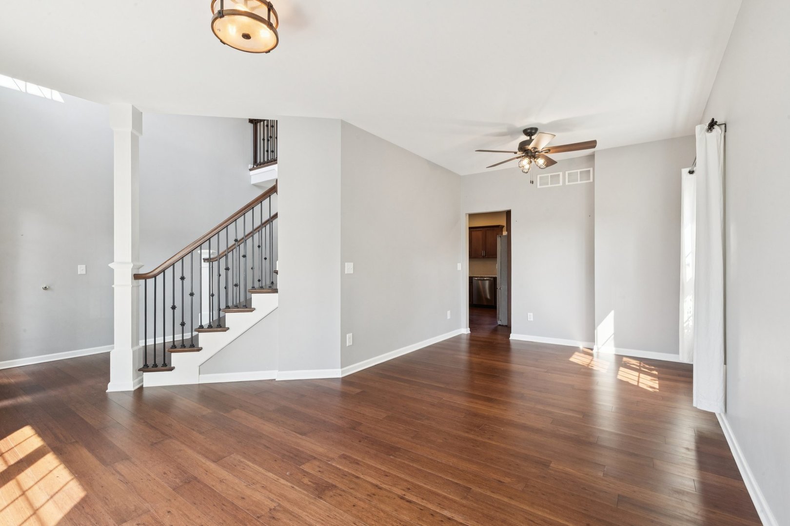 345 South Calkey Street Diamond, IL 60416 - Photo 8 of 50 a view of an empty room with wooden floor