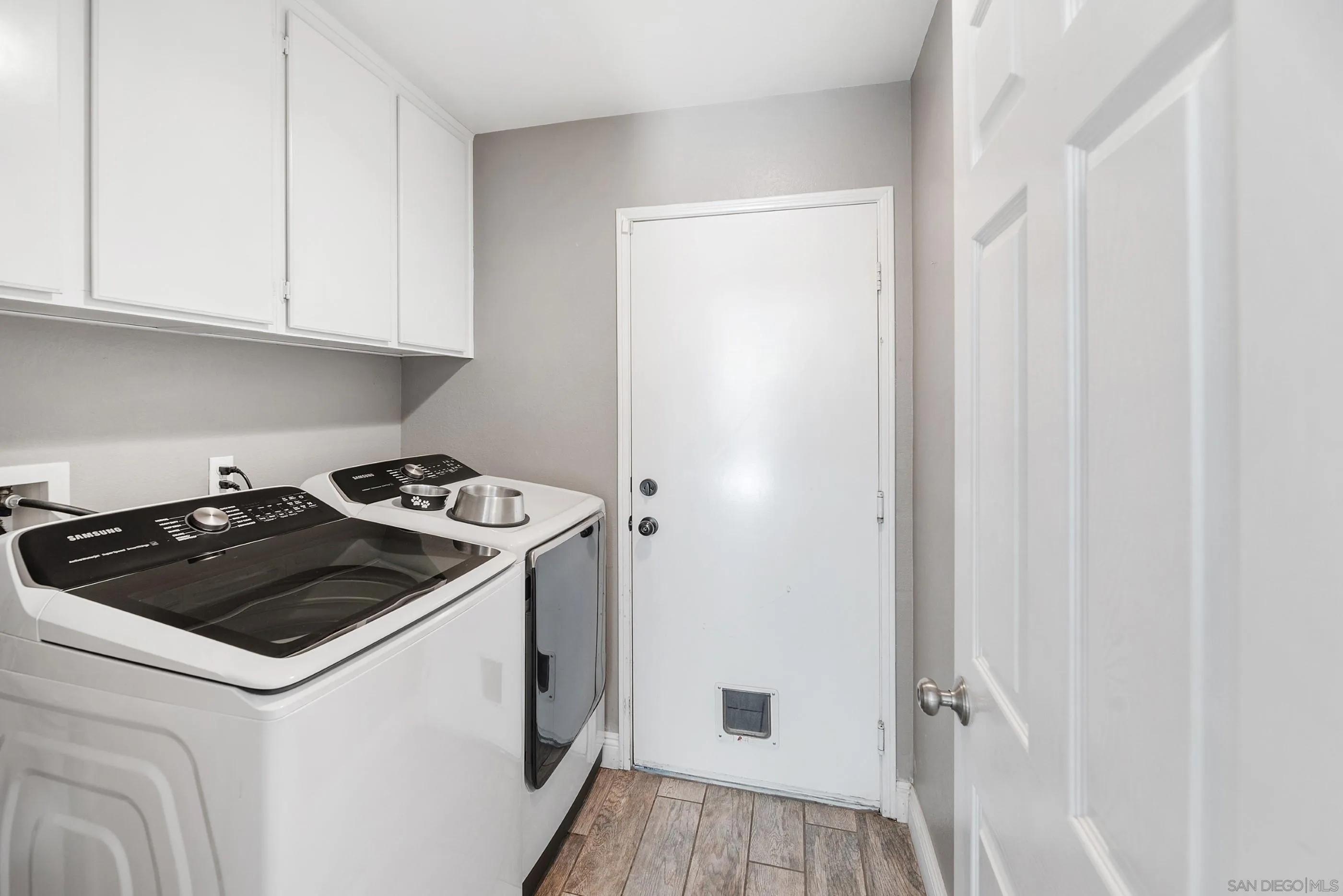2969 River Dance Way Alpine, CA 91901 - Photo 19 of 40 a kitchen with a stove and a refrigerator