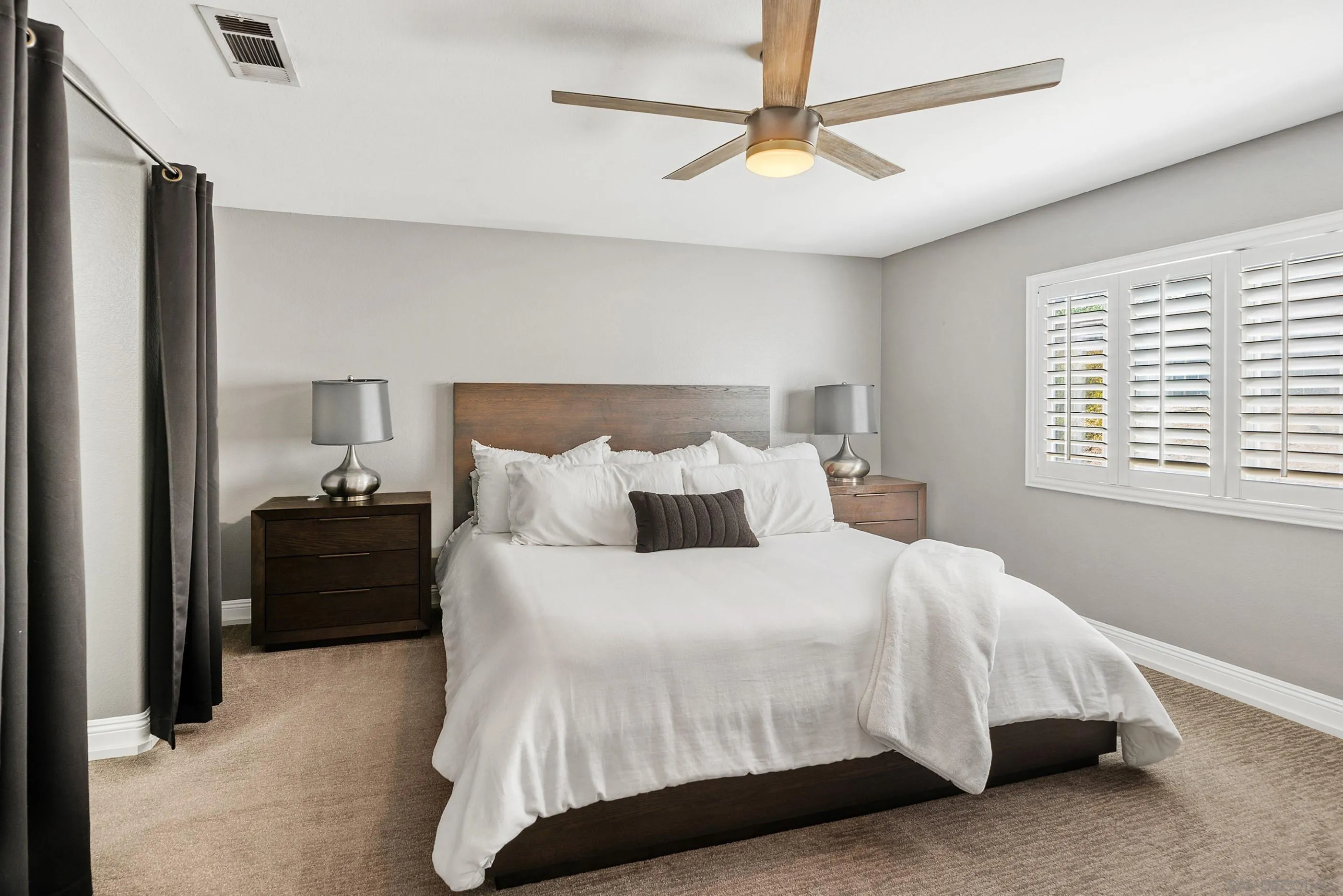 2969 River Dance Way Alpine, CA 91901 - Photo 26 of 40 a bedroom with a bed and a window