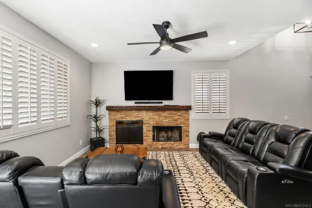 a living room with furniture or fireplace and a flat screen tv