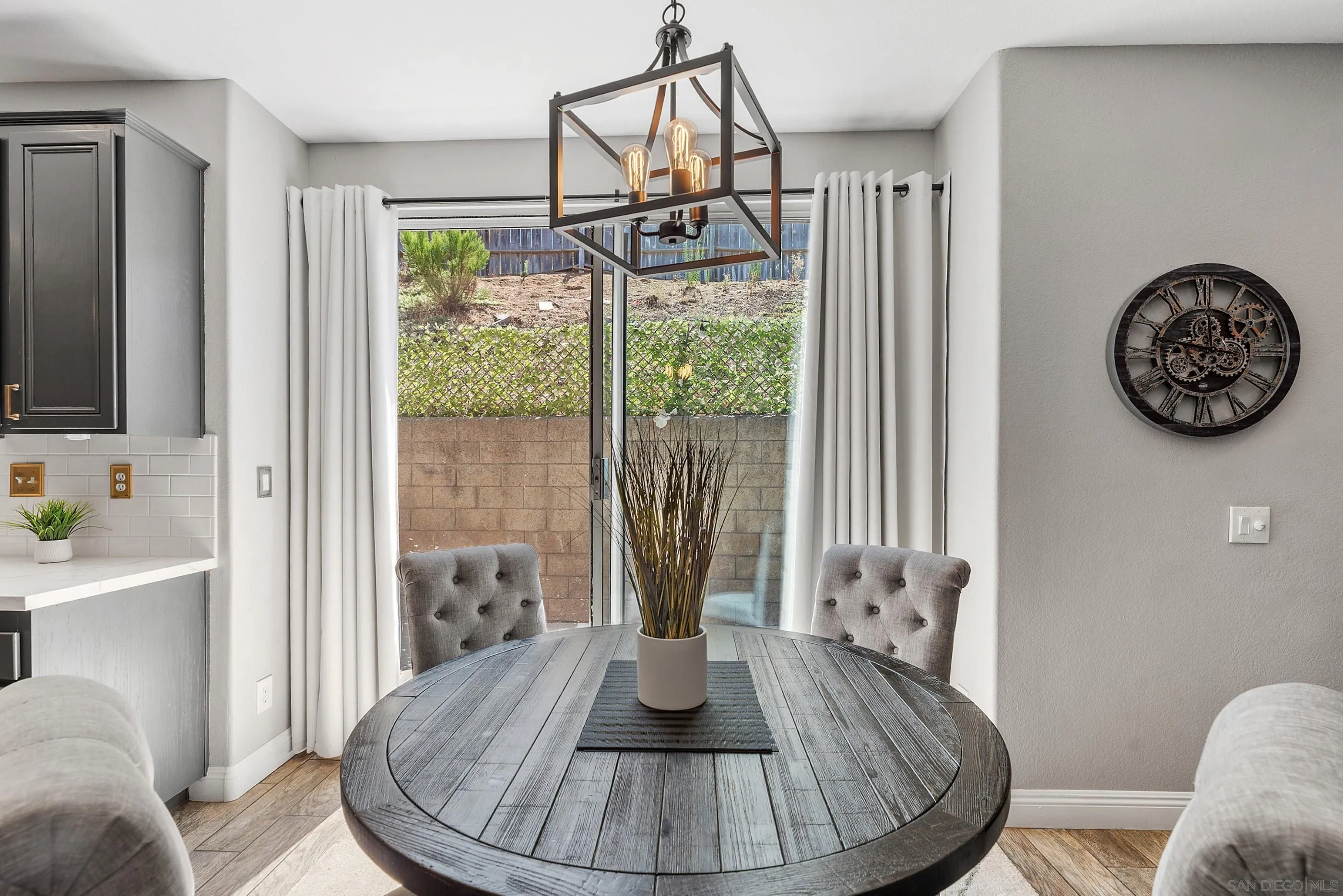 2969 River Dance Way Alpine, CA 91901 - Photo 10 of 40 a view of a dining room with furniture window and wooden floor