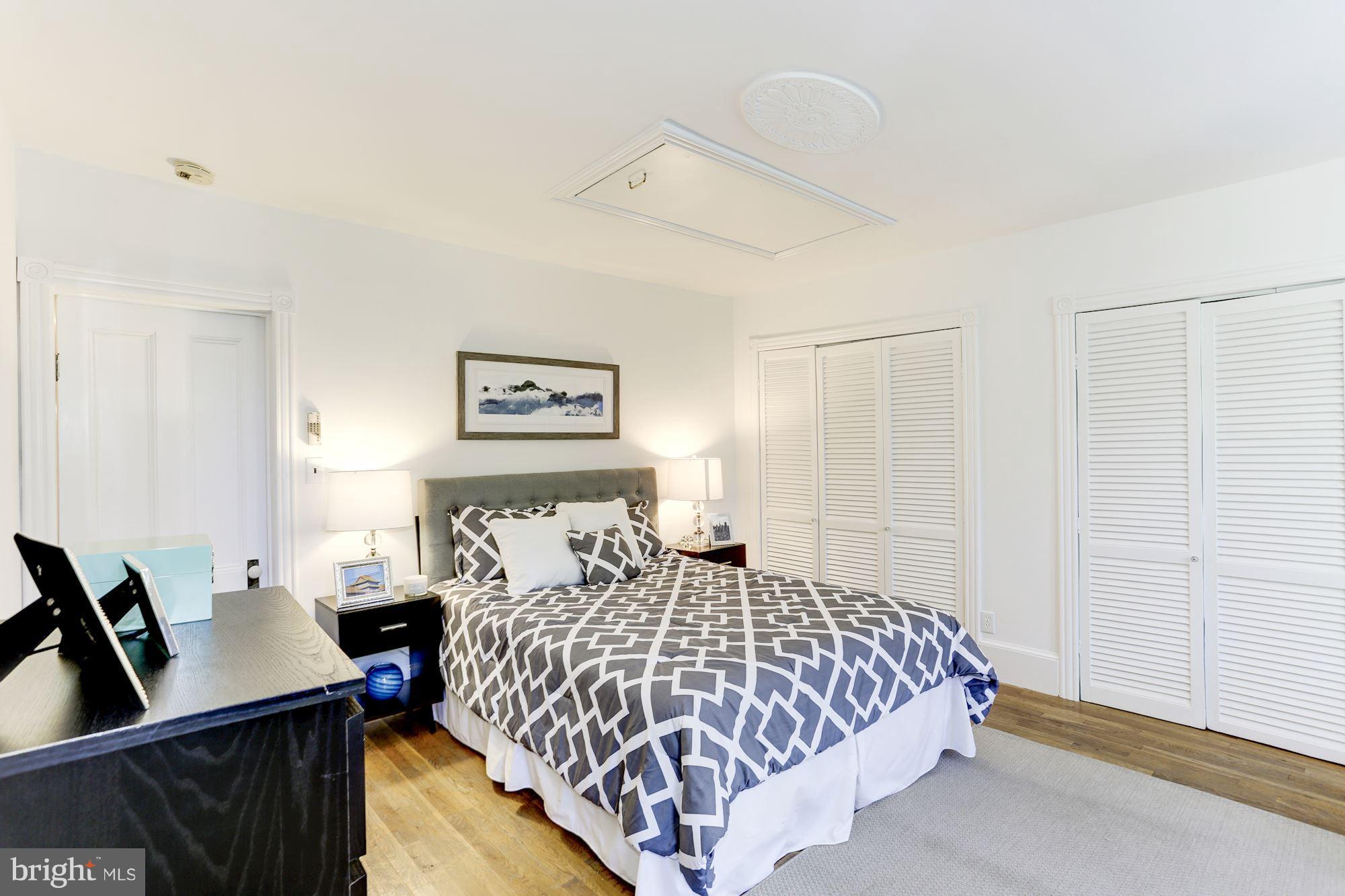 425 5th Street Northeast Washington, DC 20002 - Photo 15 of 21 a bedroom with a bed and wooden floor