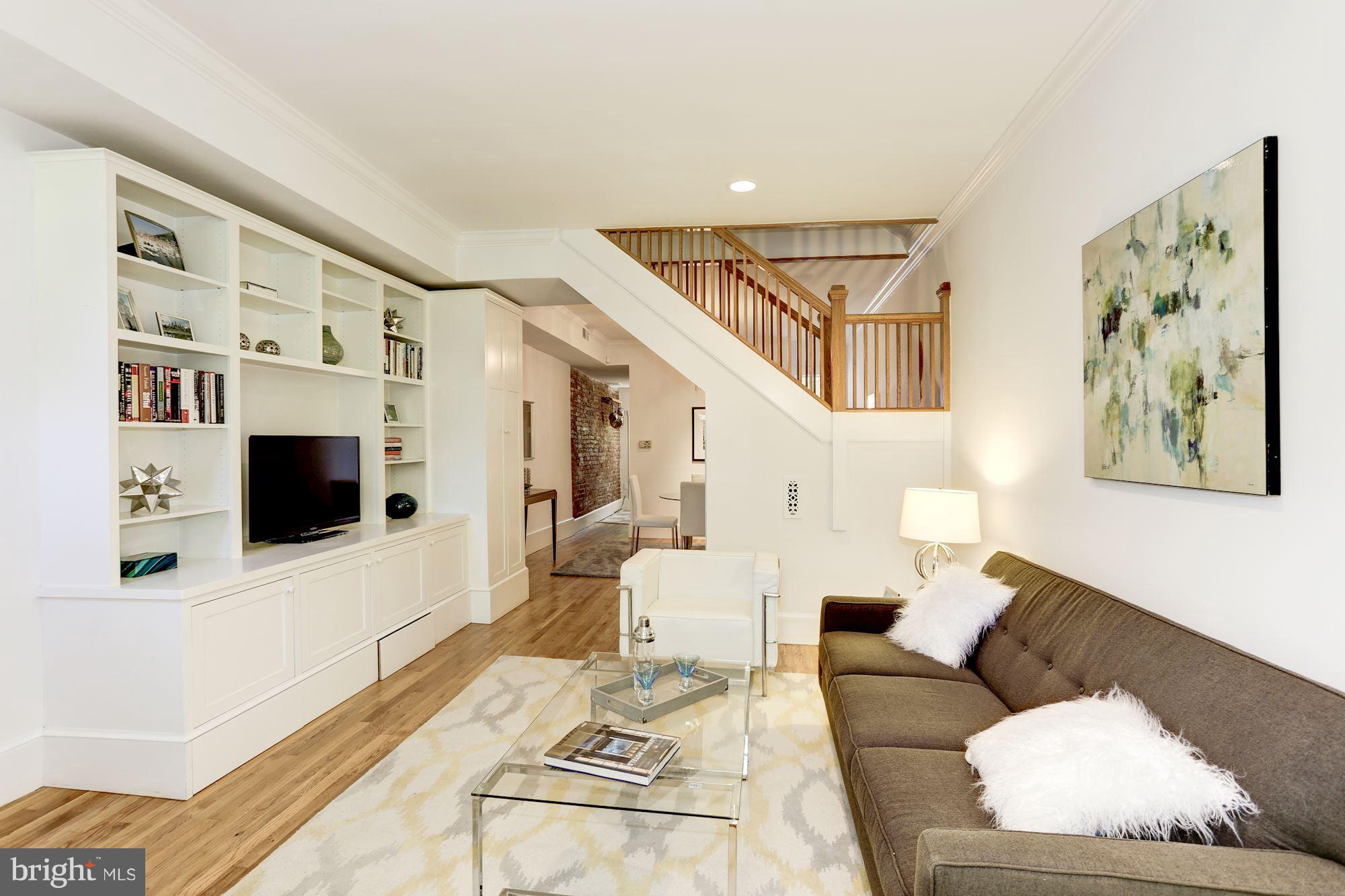 425 5th Street Northeast Washington, DC 20002 - Photo 4 of 21 a living room with furniture and a flat screen tv
