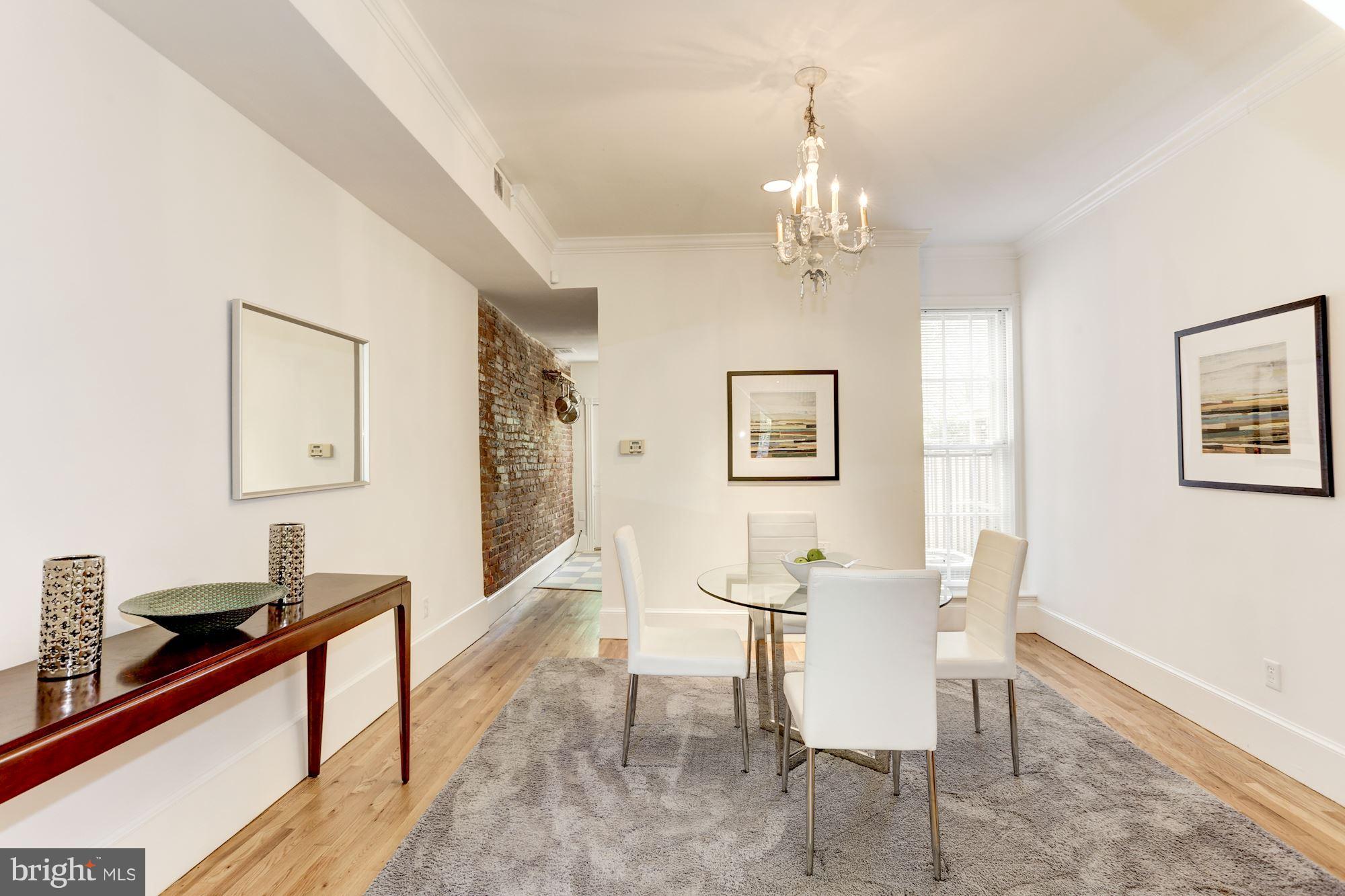 425 5th Street Northeast Washington, DC 20002 - Photo 7 of 21 a view of a dining room with furniture and chandelier