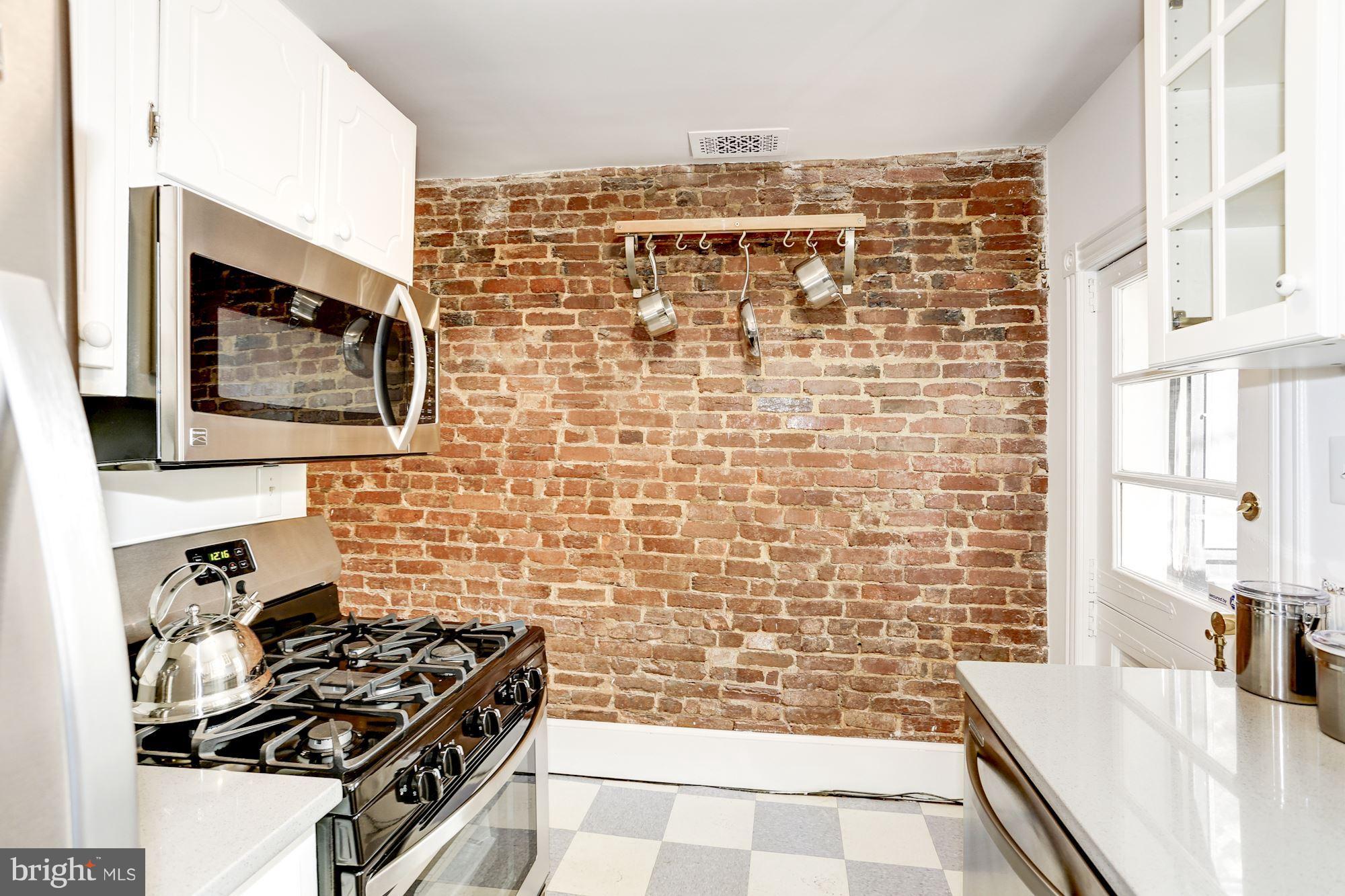 425 5th Street Northeast Washington, DC 20002 - Photo 9 of 21 a bathroom with a sink a bathtub and shower