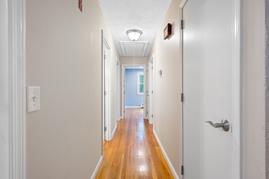 179 Beaman Road Princeton, MA 01541 - Photo 13 of 34 a view of a hallway with wooden floor