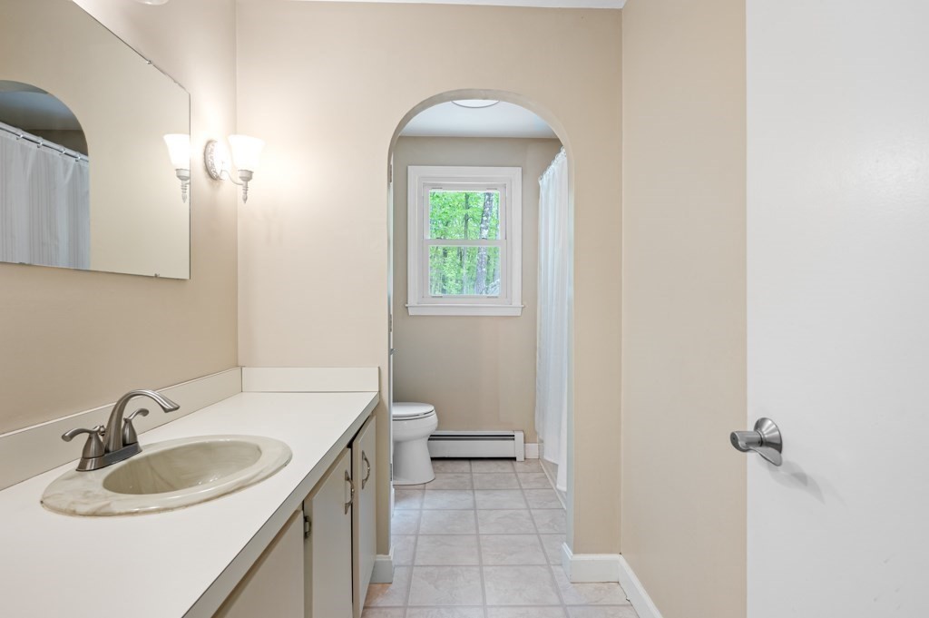 179 Beaman Road Princeton, MA 01541 - Photo 14 of 34 a bathroom with a sink and a toilet