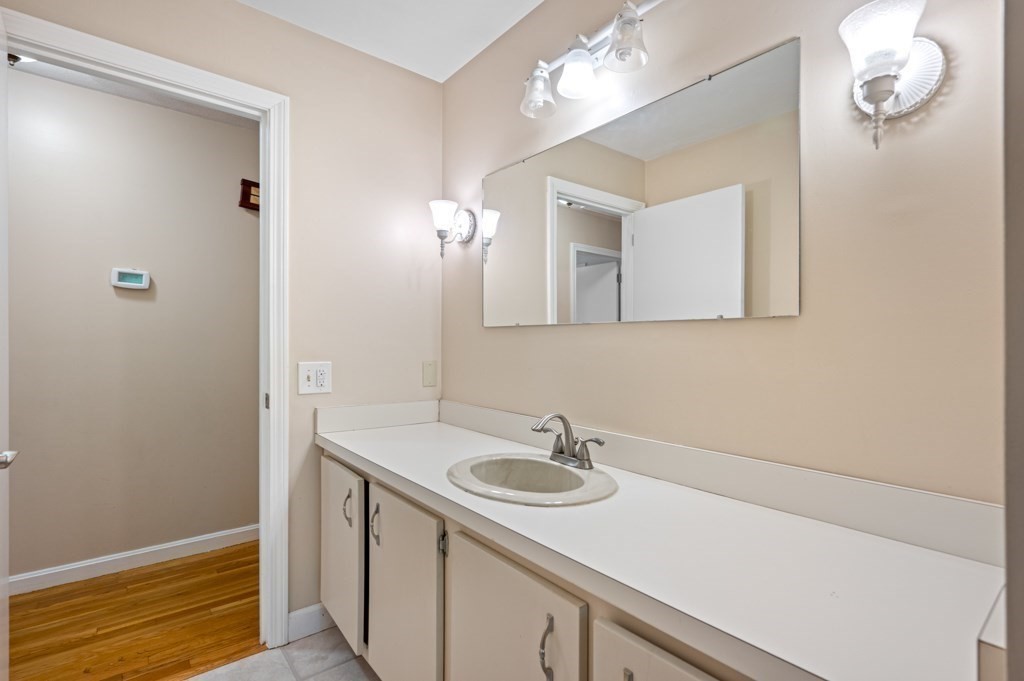 179 Beaman Road Princeton, MA 01541 - Photo 15 of 34 a bathroom with a sink and a mirror