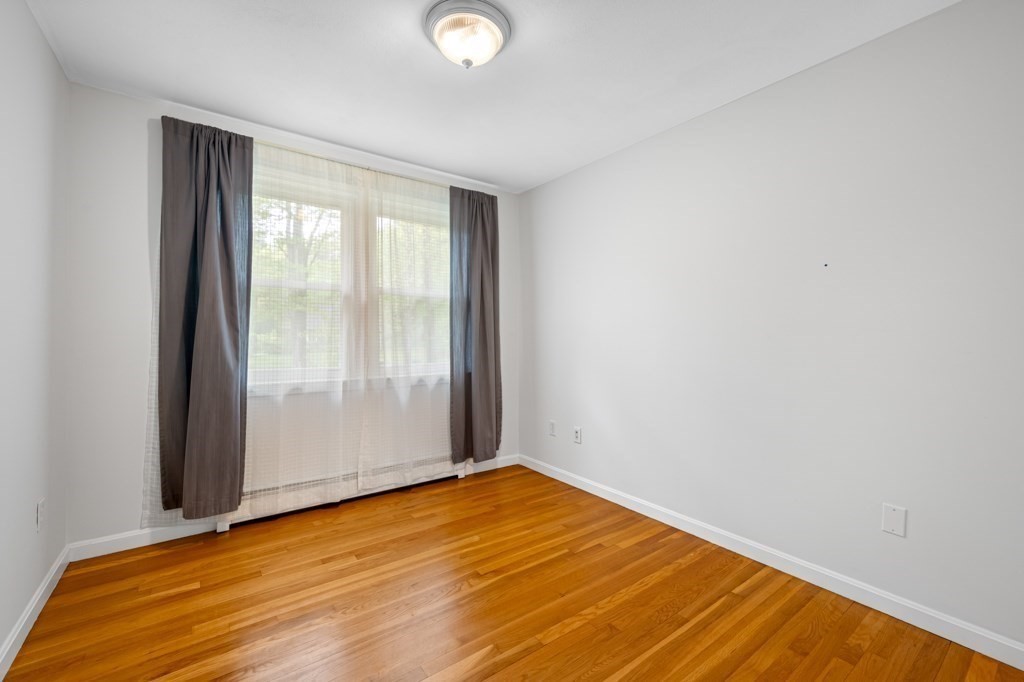179 Beaman Road Princeton, MA 01541 - Photo 18 of 34 a view of empty room with wooden floor