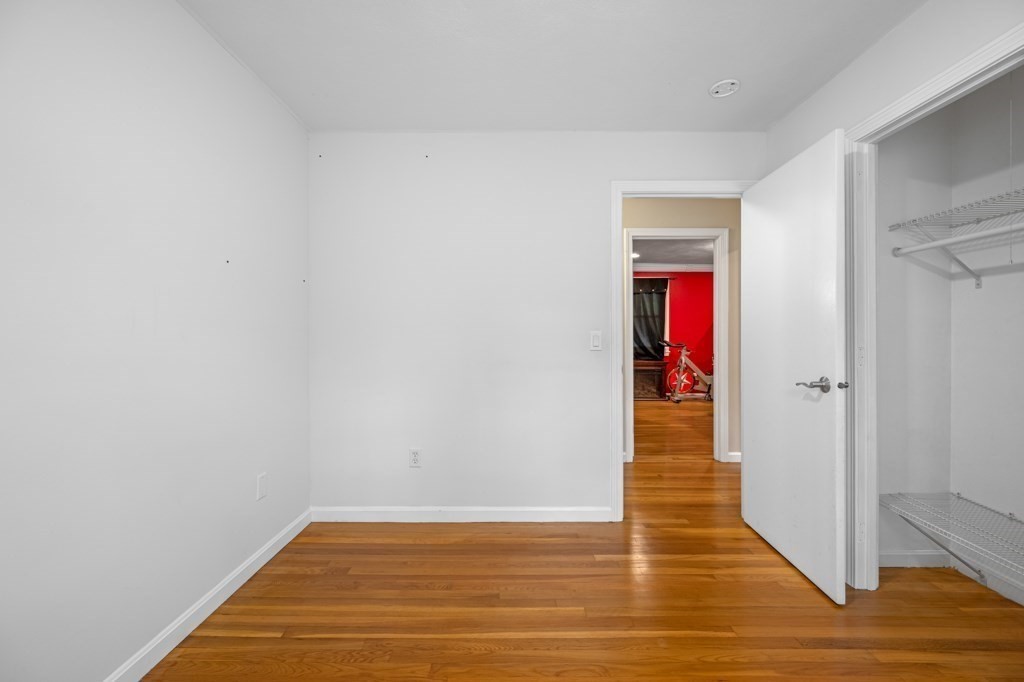 179 Beaman Road Princeton, MA 01541 - Photo 19 of 34 a view of a hallway with wooden floor