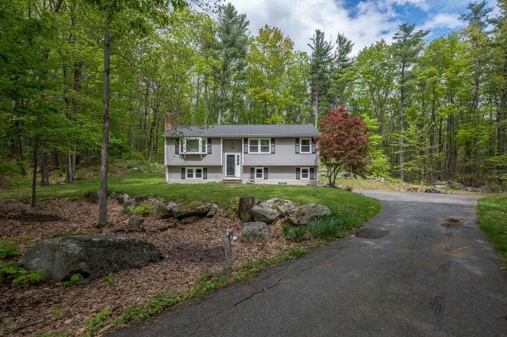 179 Beaman Road Princeton, MA 01541 - Photo 2 of 34 a view of an house with backyard space and garden