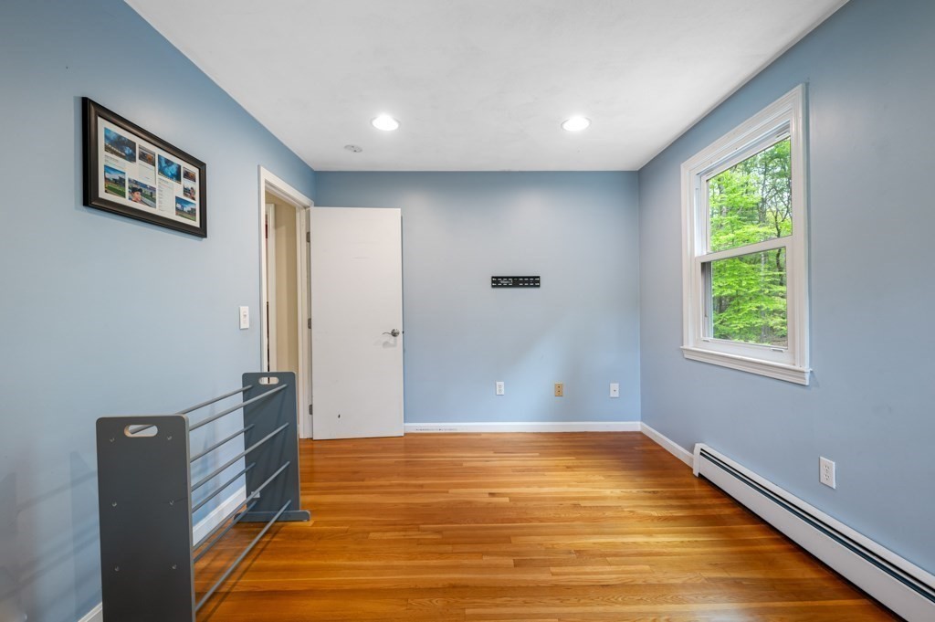 179 Beaman Road Princeton, MA 01541 - Photo 21 of 34 a view of room with window and hardwood