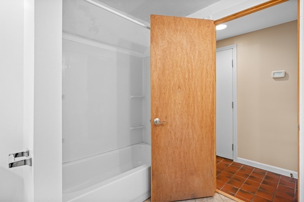 179 Beaman Road Princeton, MA 01541 - Photo 22 of 34 a bathroom with a bathtub