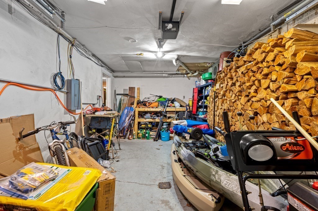 179 Beaman Road Princeton, MA 01541 - Photo 28 of 34 a storage room with lots of appliances and chairs