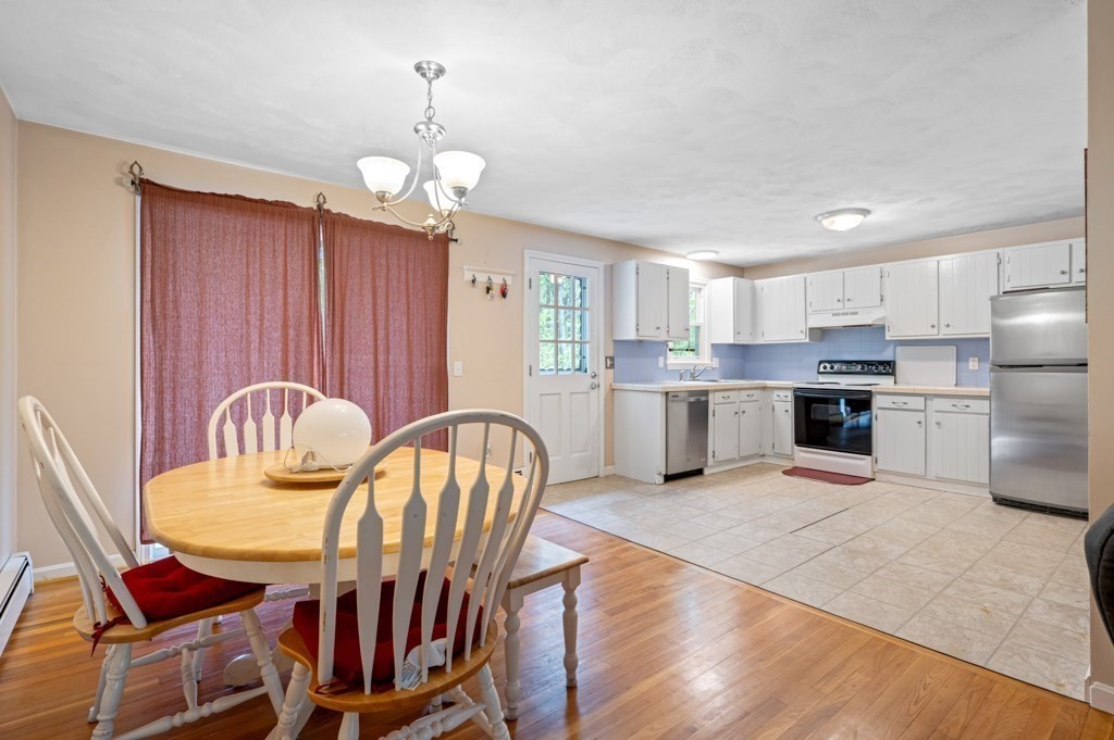 179 Beaman Road Princeton, MA 01541 - Photo 10 of 34 a view of kitchen with granite countertop cabinets table and chairs