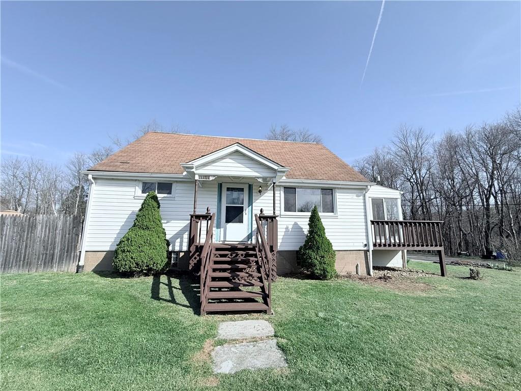 front view of a house with a yard