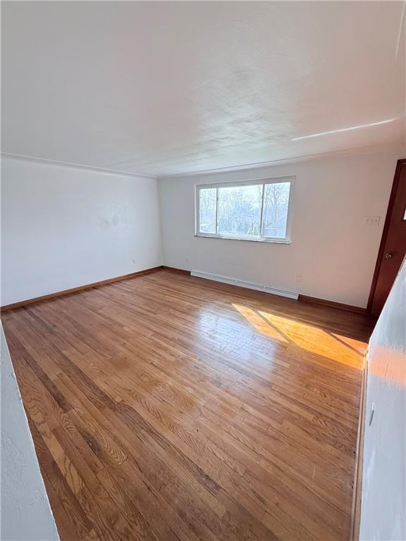 2724 Lookout Drive Elizabeth, PA 15037 - Photo 17 of 31 an empty room with wooden floor and windows