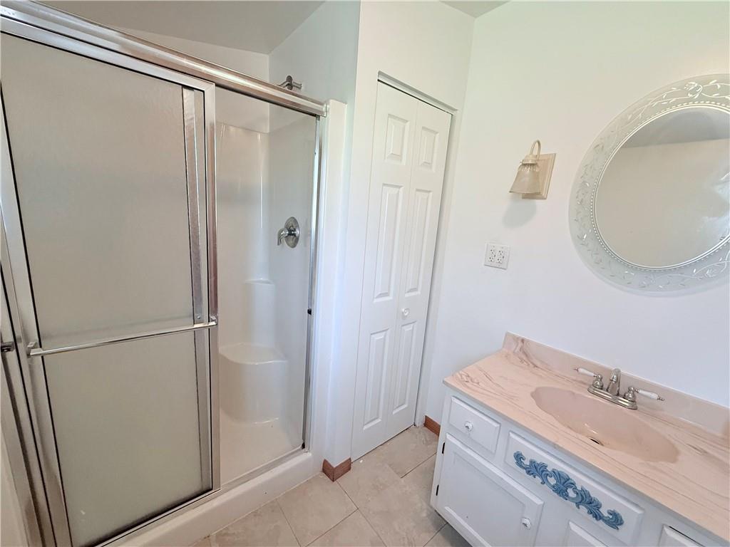 2724 Lookout Drive Elizabeth, PA 15037 - Photo 27 of 31 a bathroom with a granite countertop sink and a mirror